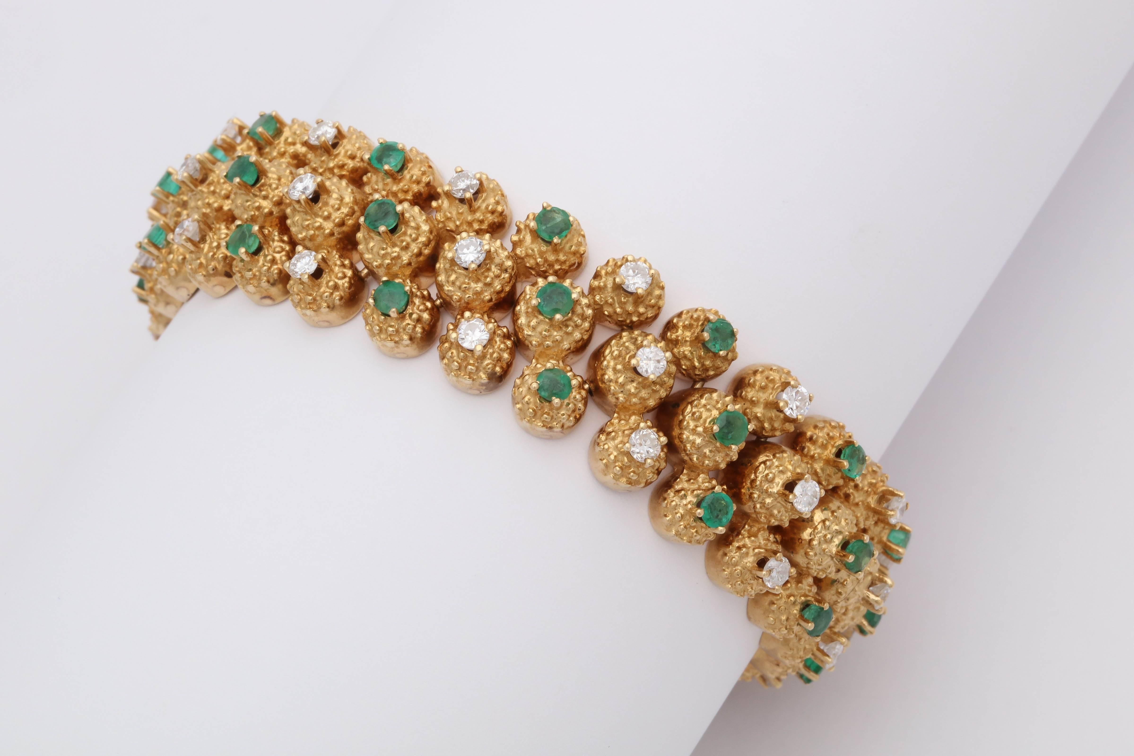 1960s Highly Flexible, Articulated Emerald and Diamond Triple-Row Gold Bracelet In Good Condition In New York, NY