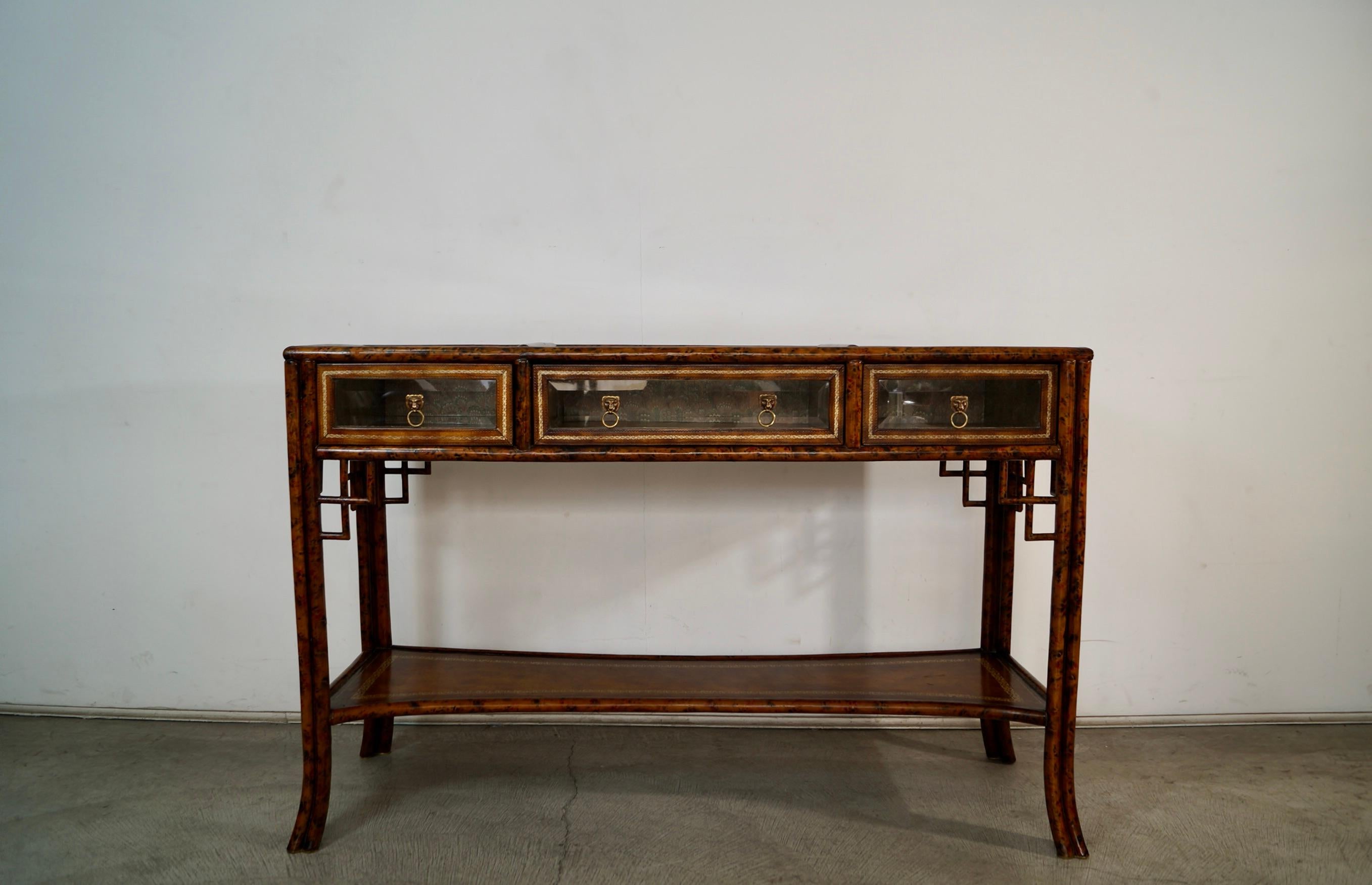 Vintage 1960's Hollywood Regency Chinoiserie console table for sale. Beautiful and rare piece designed in the late 1960's by Maitland Smith, and is wonderfully designed. Maitland Smith created high-end design furniture that is now highly sought