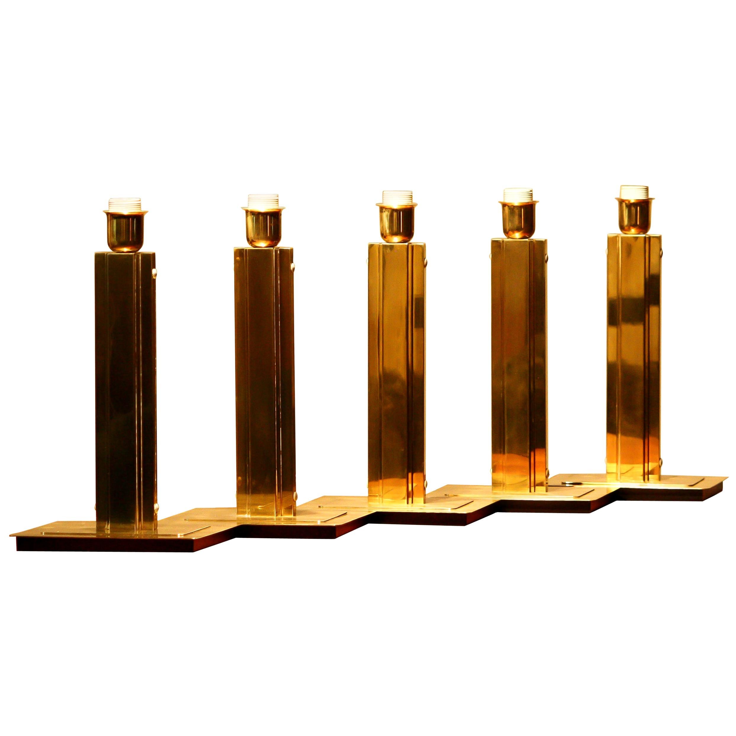 Beautiful set of five brass Hollywood Regency table lamps.
Made by Örsjo, Sweden.
All in good condition and technically 100%.

Period: 1960
The dimensions are: W 25 cm, 10 inch, D 20 cm, 8 inch, H 43 cm, 17 inch.