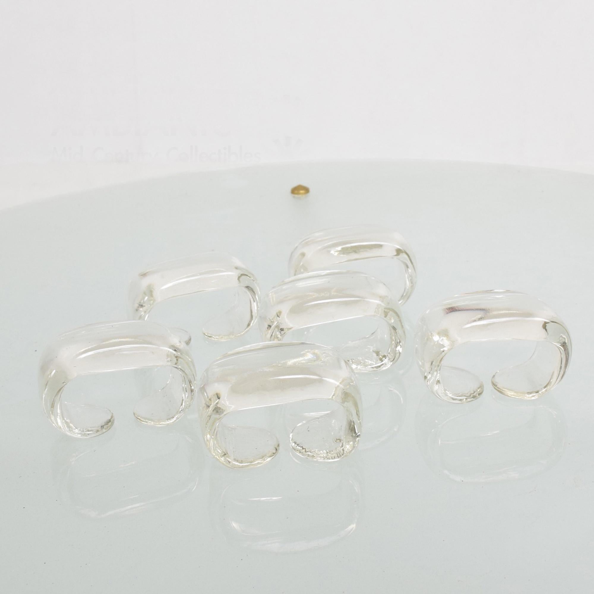 1960s Hollywood Regency modern style of Daum art glass, set of 6 glass napkin ring holders 
No label apparent. In the manner of Daum Nancy art glass, France. 
 Dimensions: 2 1/4