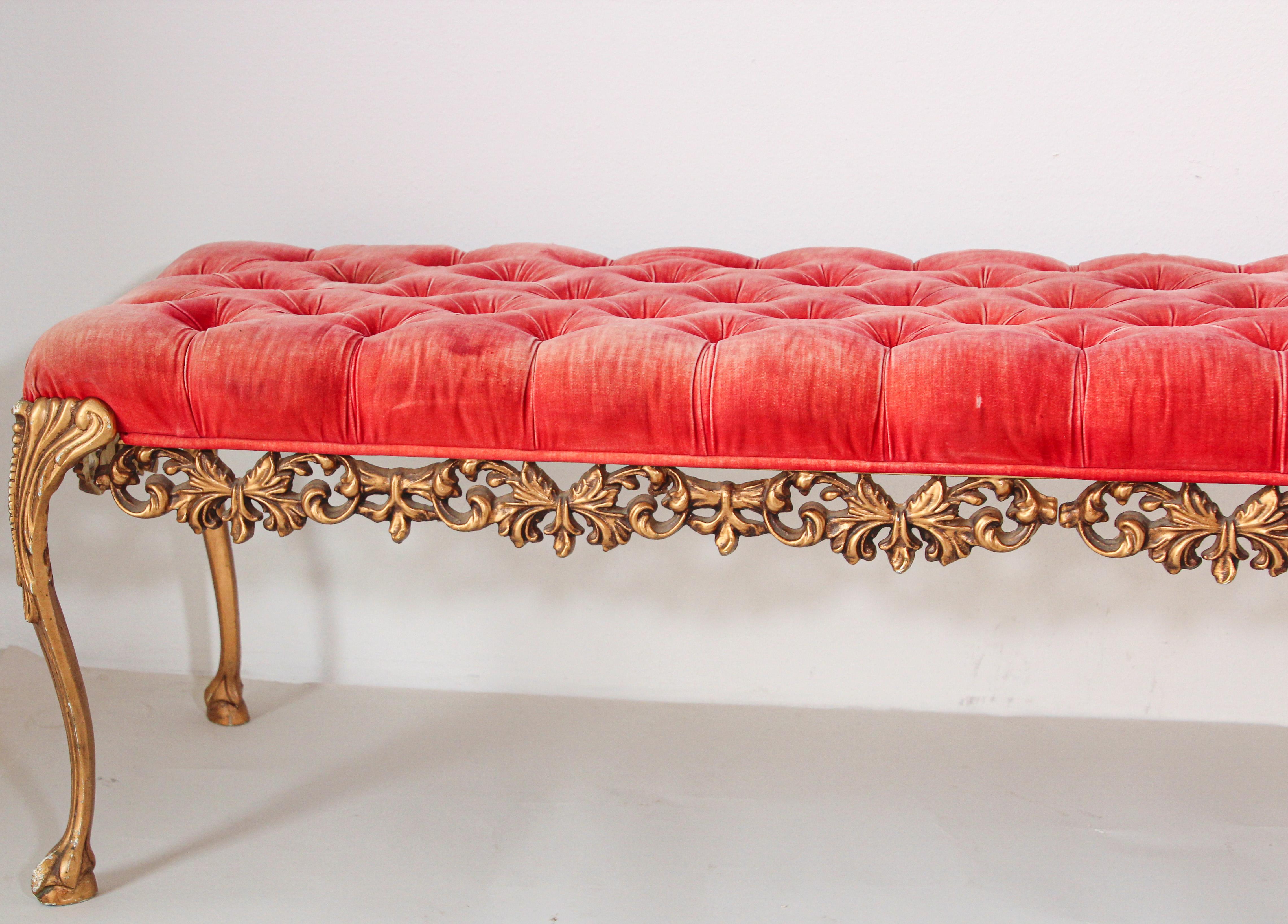 Beautiful vintage 1960s Hollywood Regency red velvet tufted bench.
Glamorous model 