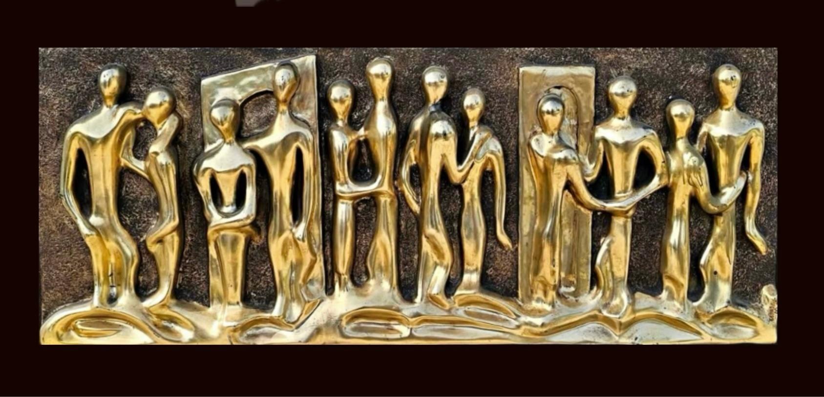 Exquisite, monumental, brutalist, fiberglass figural wall sculpture entitled “Lovers” by Espada for Finesse Originals. 

Monumental, three dimensional, raised gold figures, mounted on a scored dark wooden plaque

A three dimensional fiberglass wall