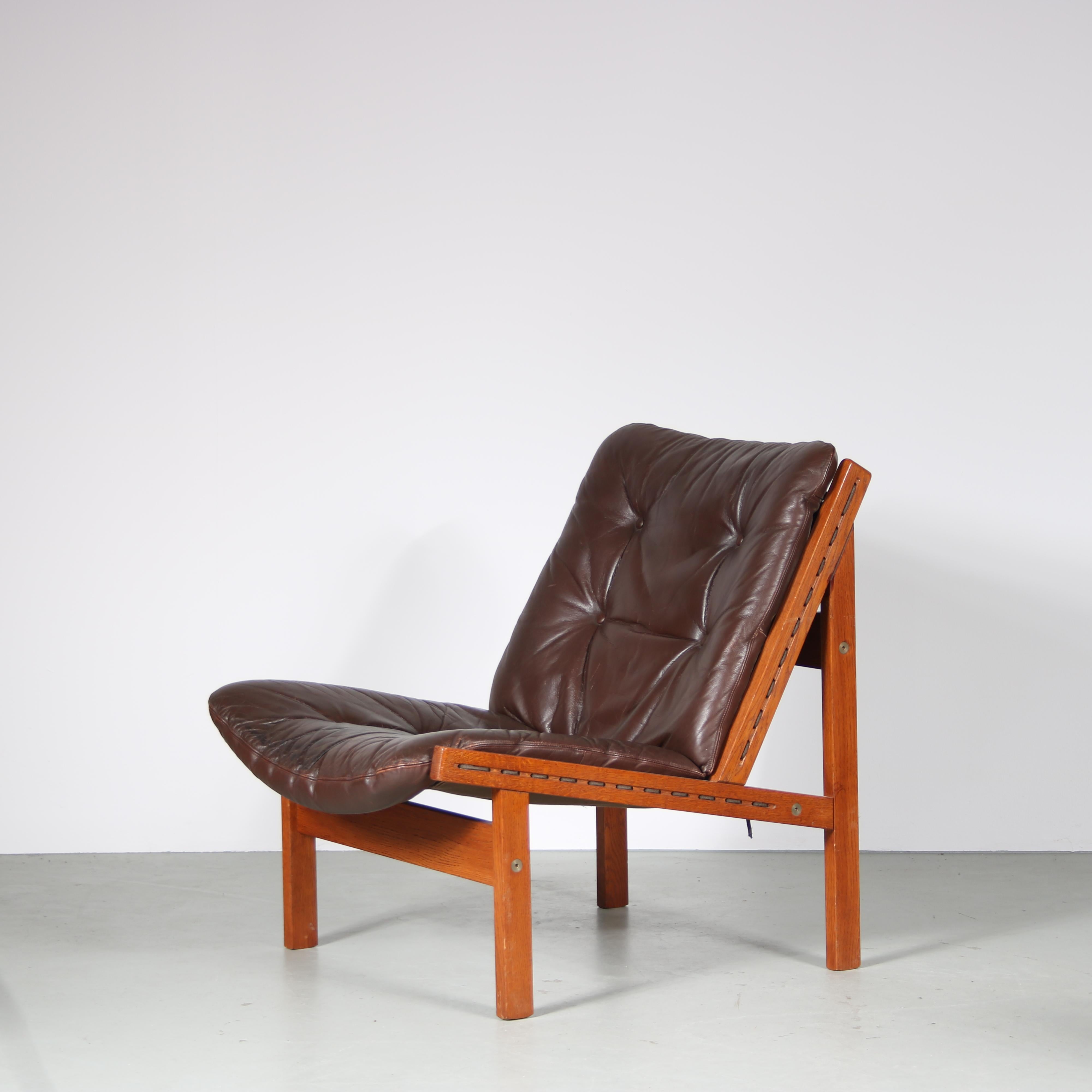 Mid-20th Century 1960s “Hunting chair” + ottoman by Torbjorn Afdal for Bruksbo, Norway For Sale