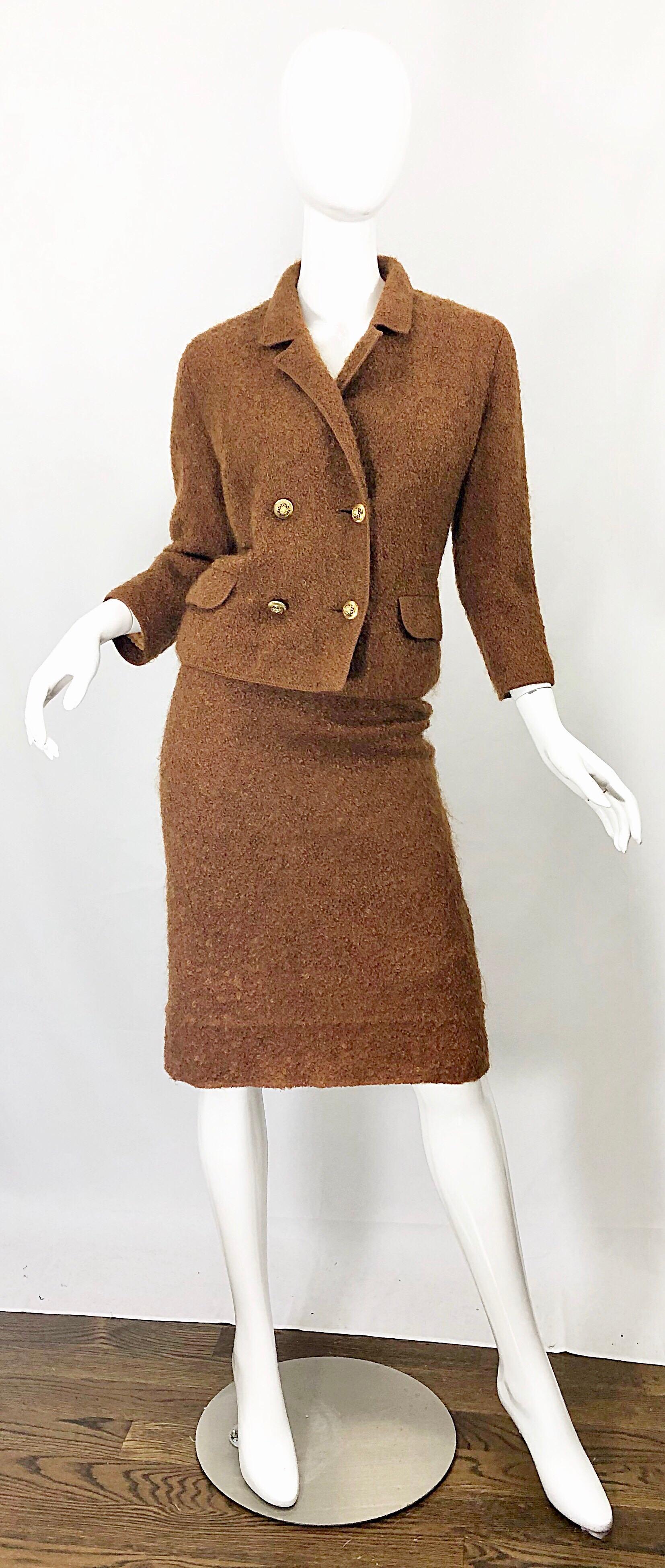 Incredibly chic vintage early 1960s I. MAGNIN tobacco rust brown mohair skirt suit! Features a soft wool mohair that is fully lined in a nude silk chiffon. Double breasted fitted blazer with a high waisted pencil skirt. Jacket features four gold