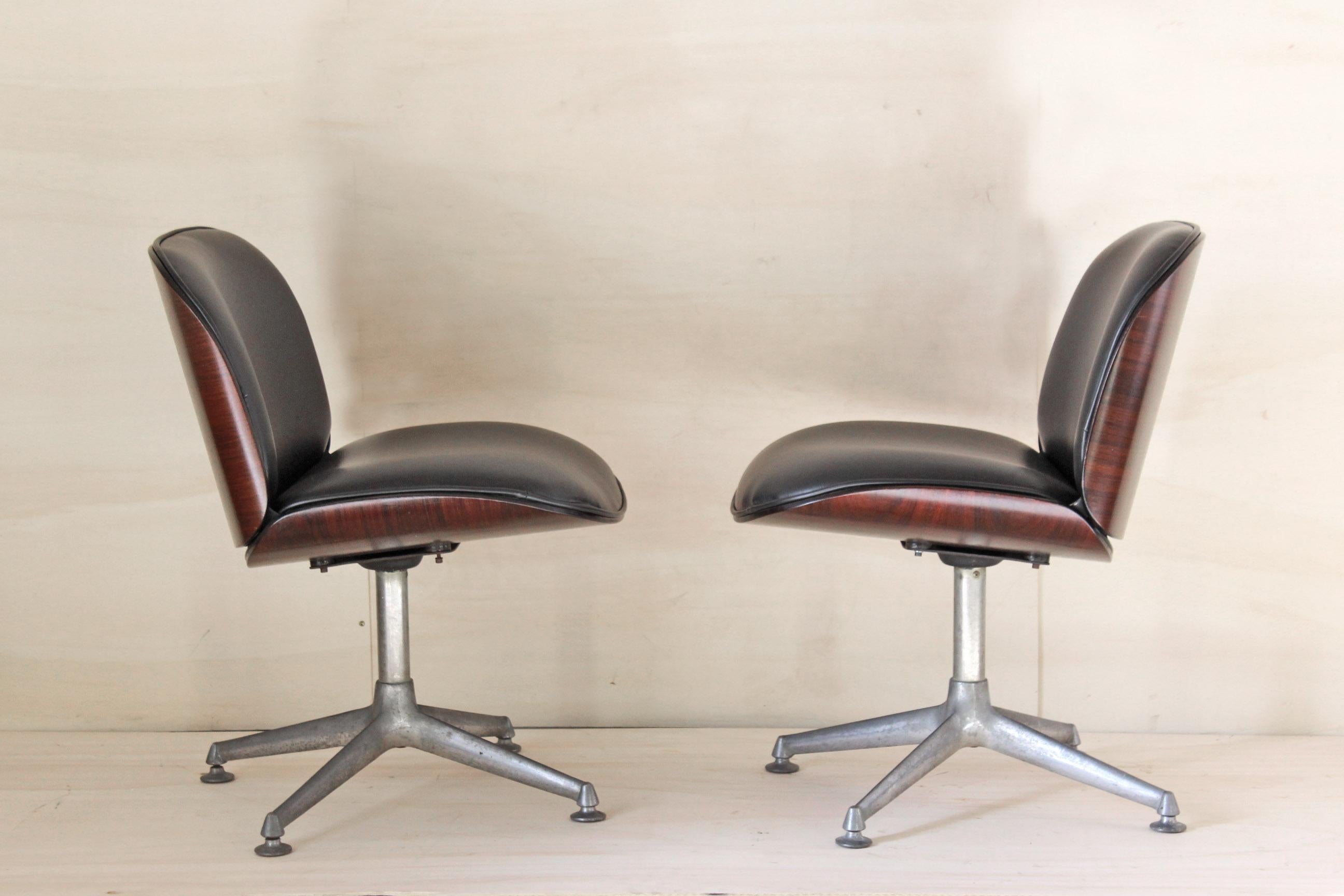 Set of two desk vintage armchairs. Designed by Italian design icon ICO Parisi for MIM Roma ltd in the 1960s. Leather seat, rosenwood structure and steel base. In excellent conditions with only few signs of time.