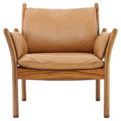 1960s Illum Wikkelsø Genius Fauteuil Palisander en cuir:: Danemark