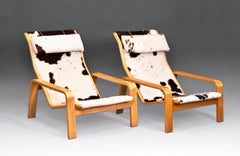 1960s Ilmari Lappalainen “Pulkka” Lounge Chairs in Beech Wood and Cowhide