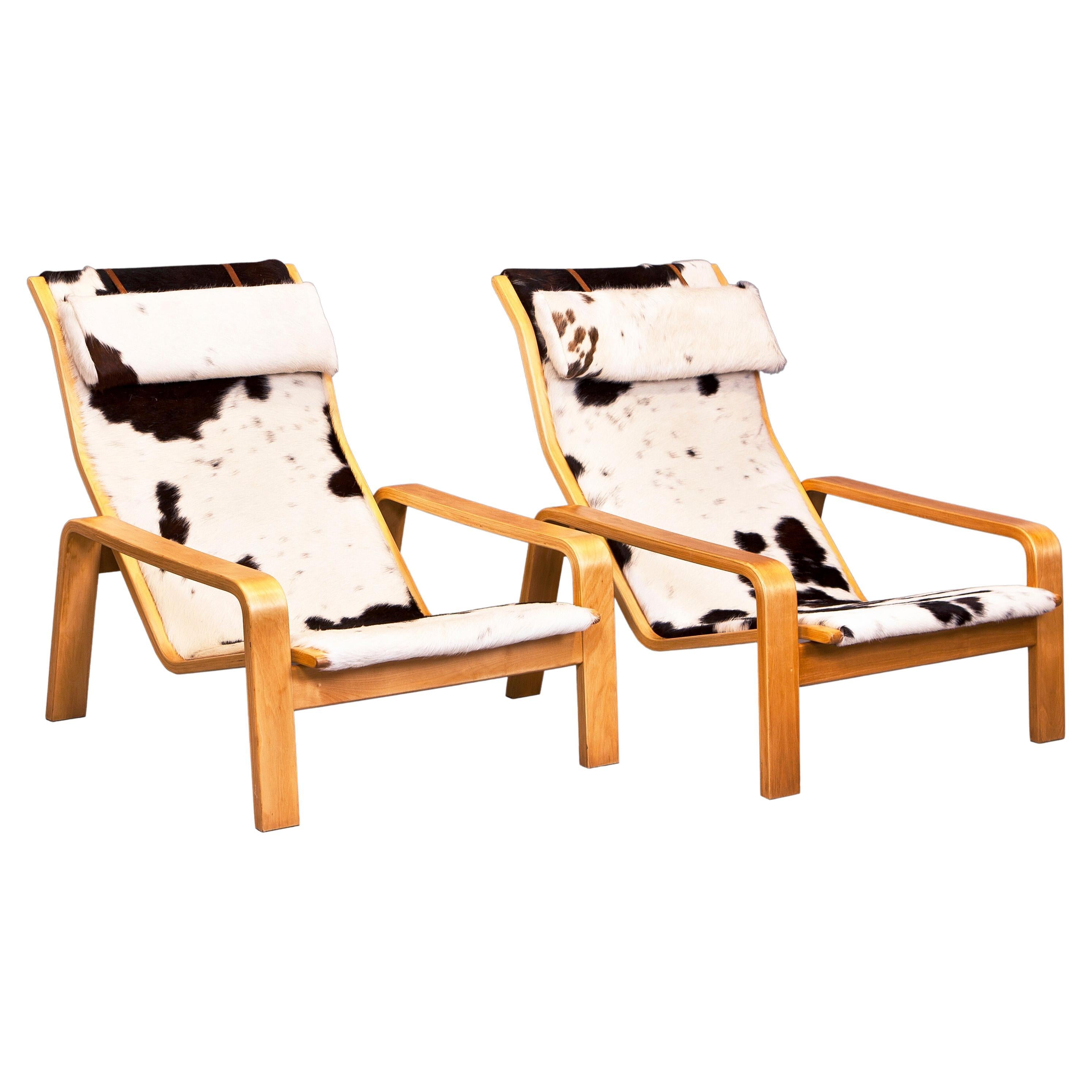 1960s Ilmari Lappalainen “Pulkka” Lounge Chairs in Beech Wood and Cowhide