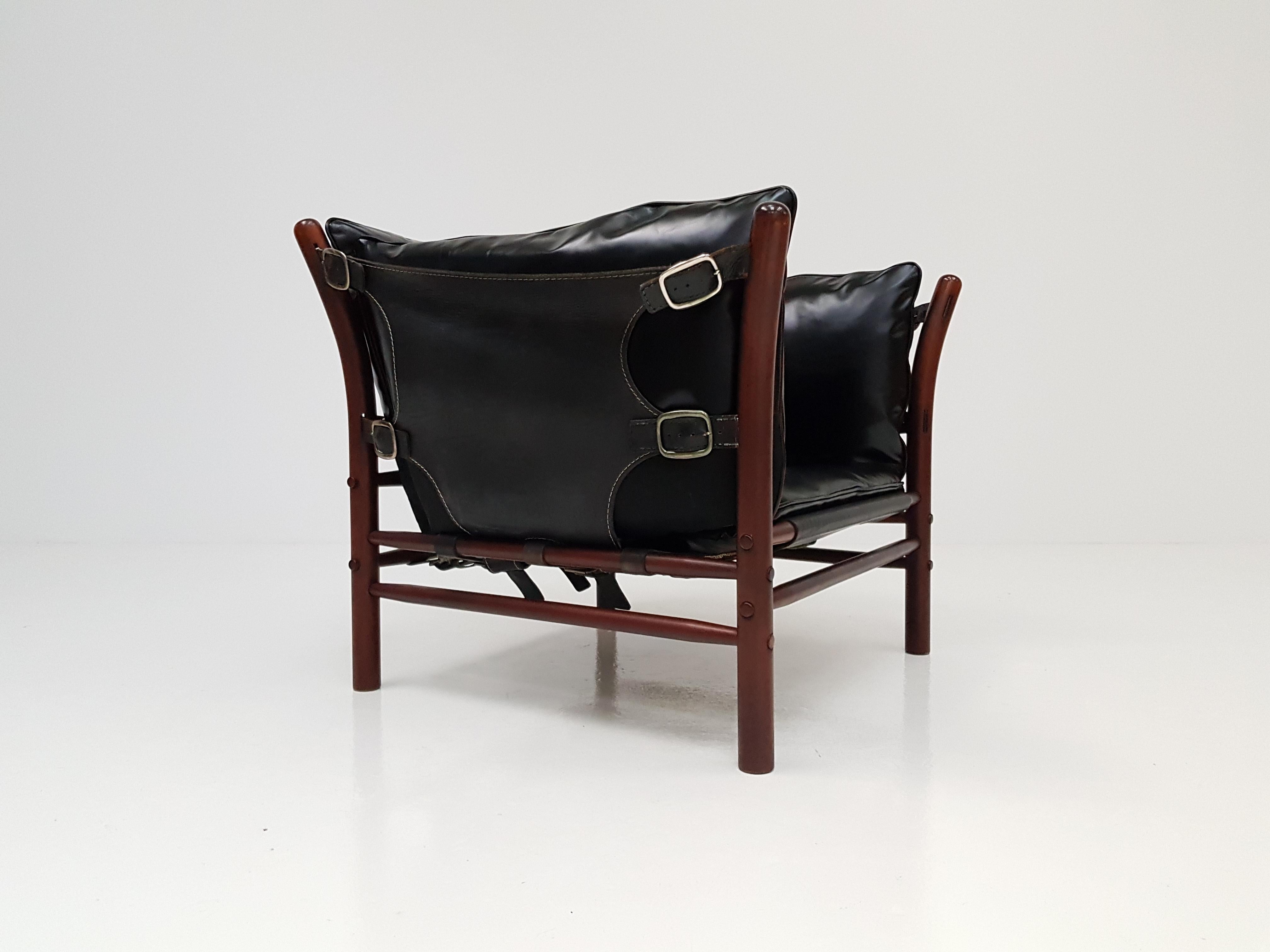 A 1960s 'Ilona' chair by Swedish Designer Arne Norell.

Featuring stained beech, brass buckles and saddle leather with 4 loose cushions. This is a rarer variant of the Ilona design which has a very current and en-trend look.

We can offer very