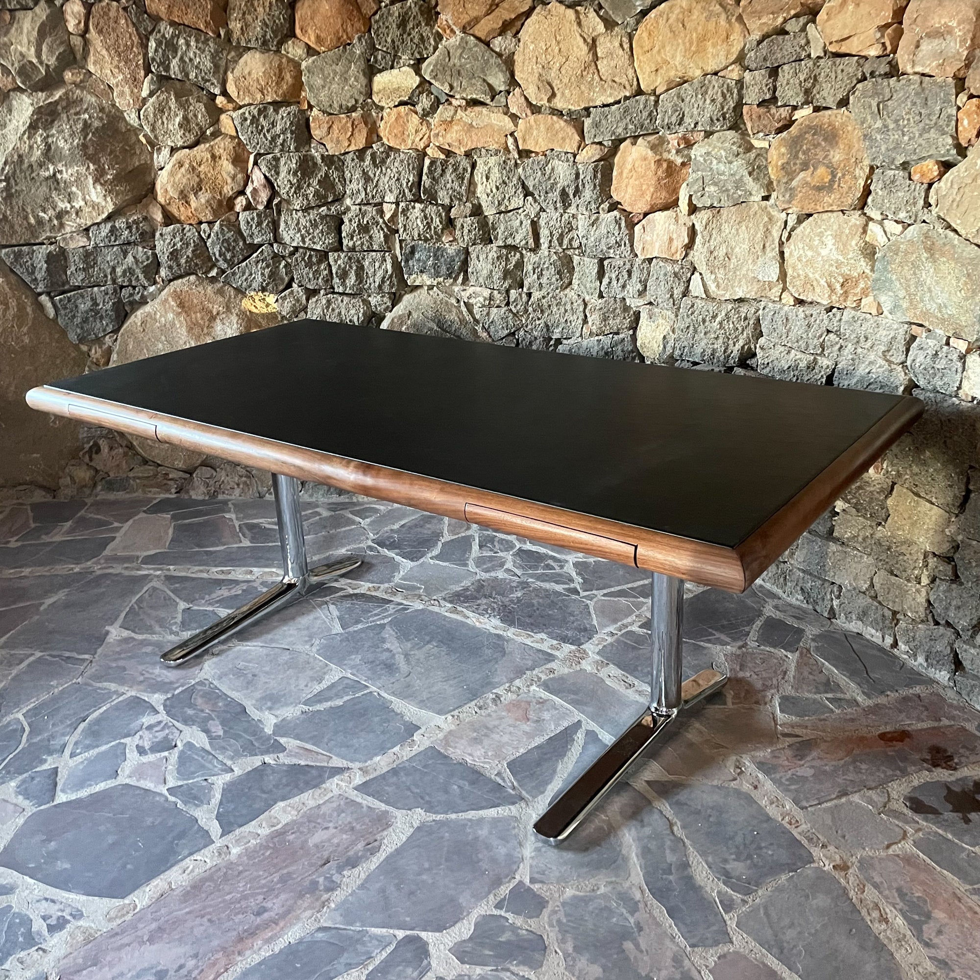 Desk
1960s Modern Desk designed by Warren Platner for Knoll. Chrome plated legs in a cantilever design. Luxurious Walnut Wood with black faux leather top. Sculptural pullout drawers. 
Original Vintage Restored. Excellent condition. No label
