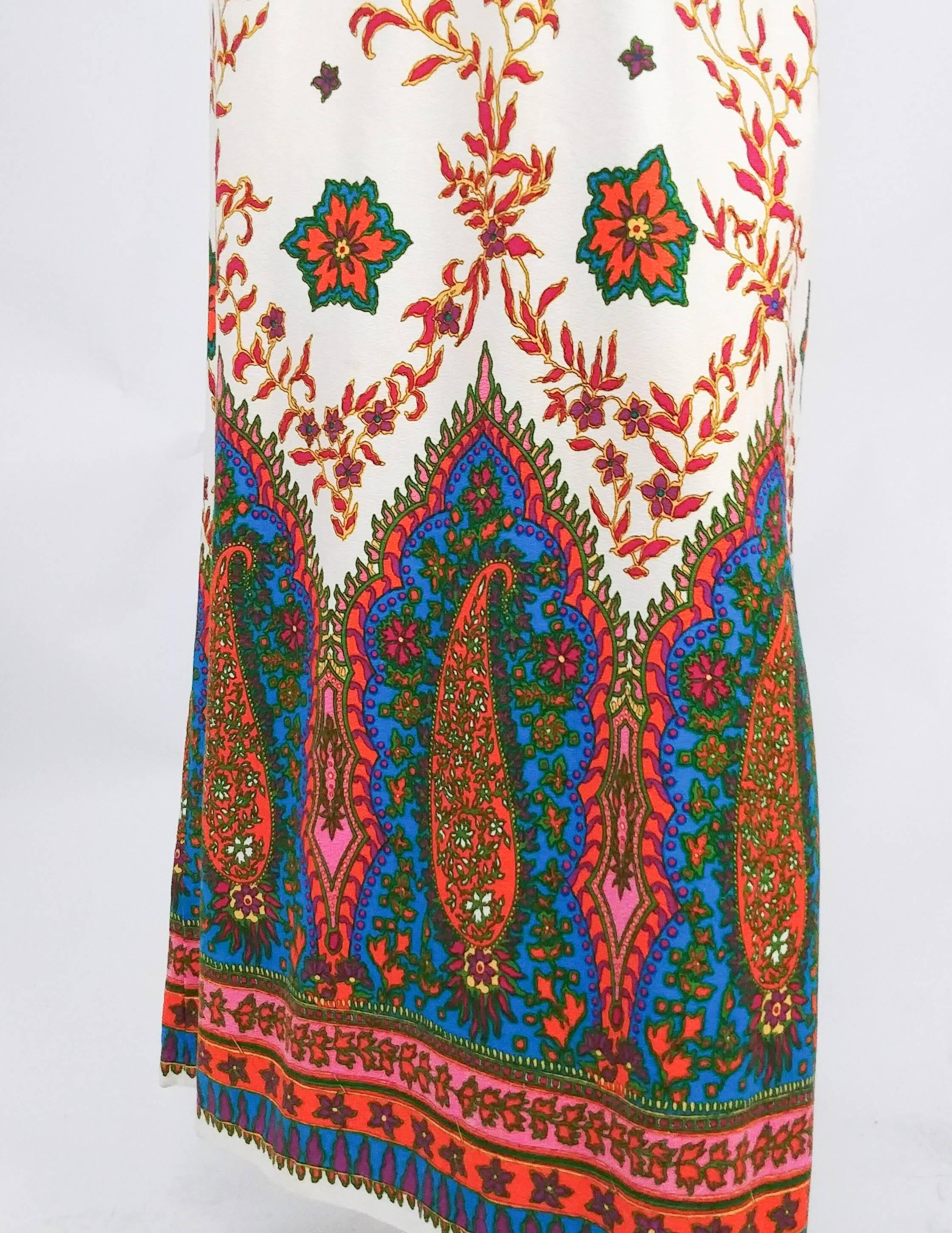 1960s Indian Print Maxi Dress. Colorful border print, raglan cut sleeveless dress, zips up back.