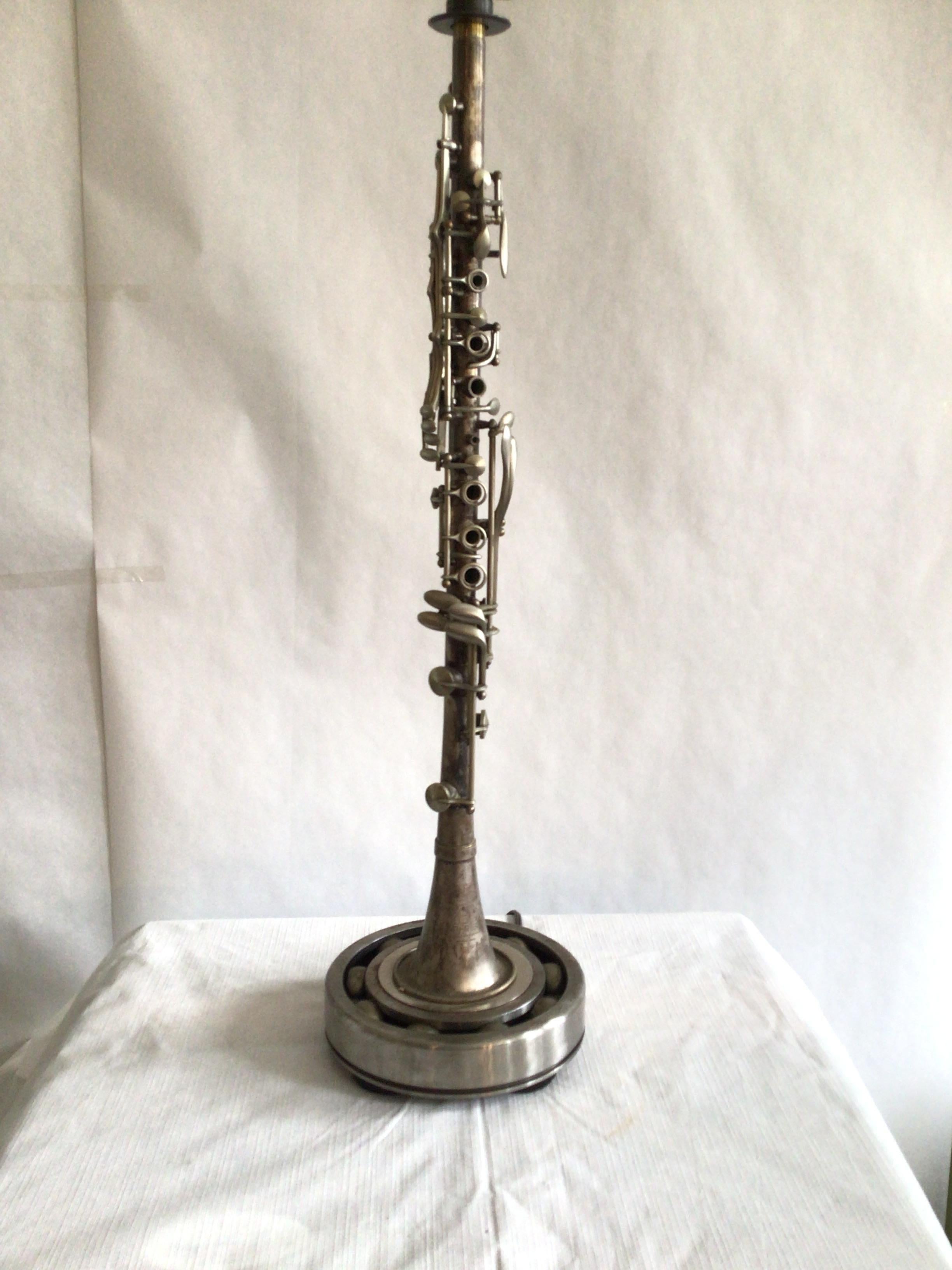 1960s Metal industrial musical instrument clarinet table lamp.
Signed PARIS.
Numbered 8/11.
Height to top of socket.