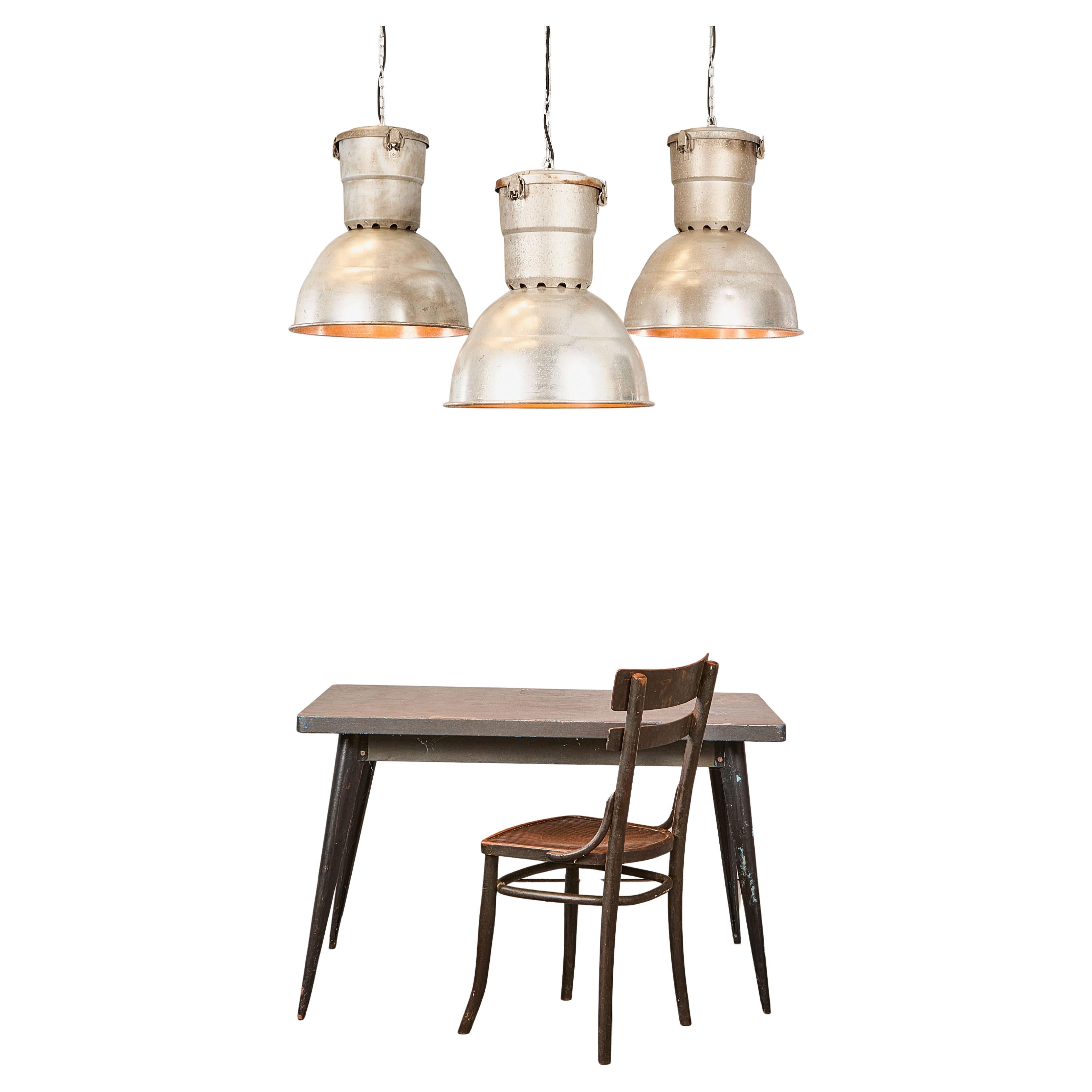 1960s large industrial spun aluminium French ceiling pendant lamps/light shades. 

Featuring large spun aluminium shades and aluminium galleries tops. The key feature of these lamps is their aluminium construction and original condition and size, we