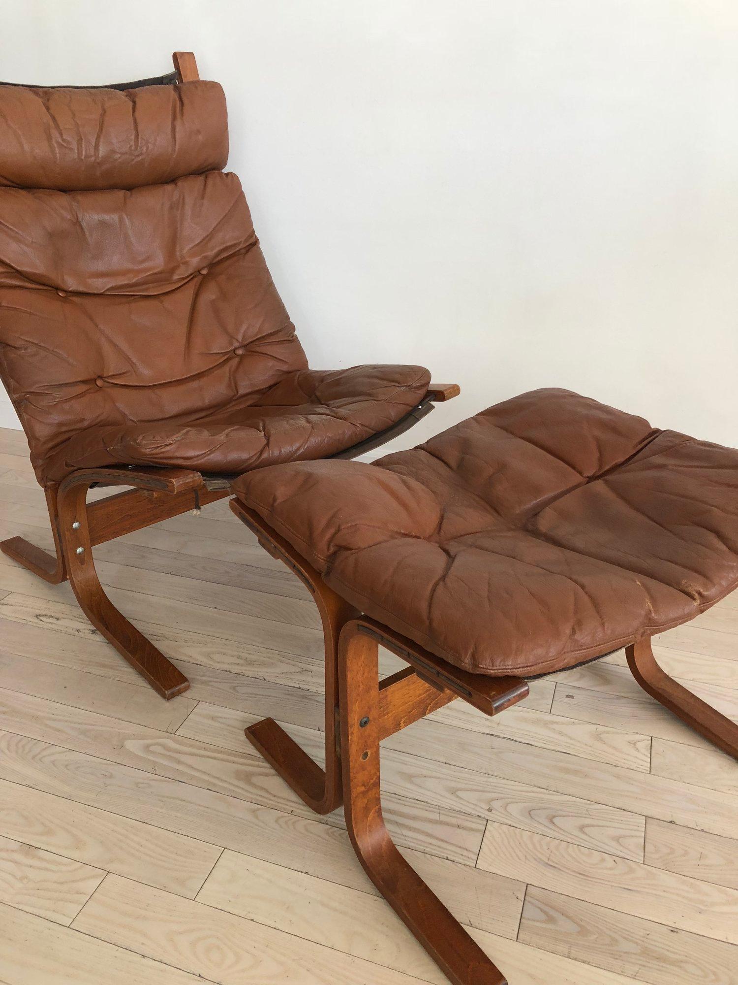 1960s Scandinavian Westnofa “Siesta” high lounge chair and ottoman. Leather detachable cushions with lisper. canvas sling. Bent wood Fram. Made in Norway by Westnofa designed by Ingmar Relling. Super cozy statement chair. 

Sold as a set chair and