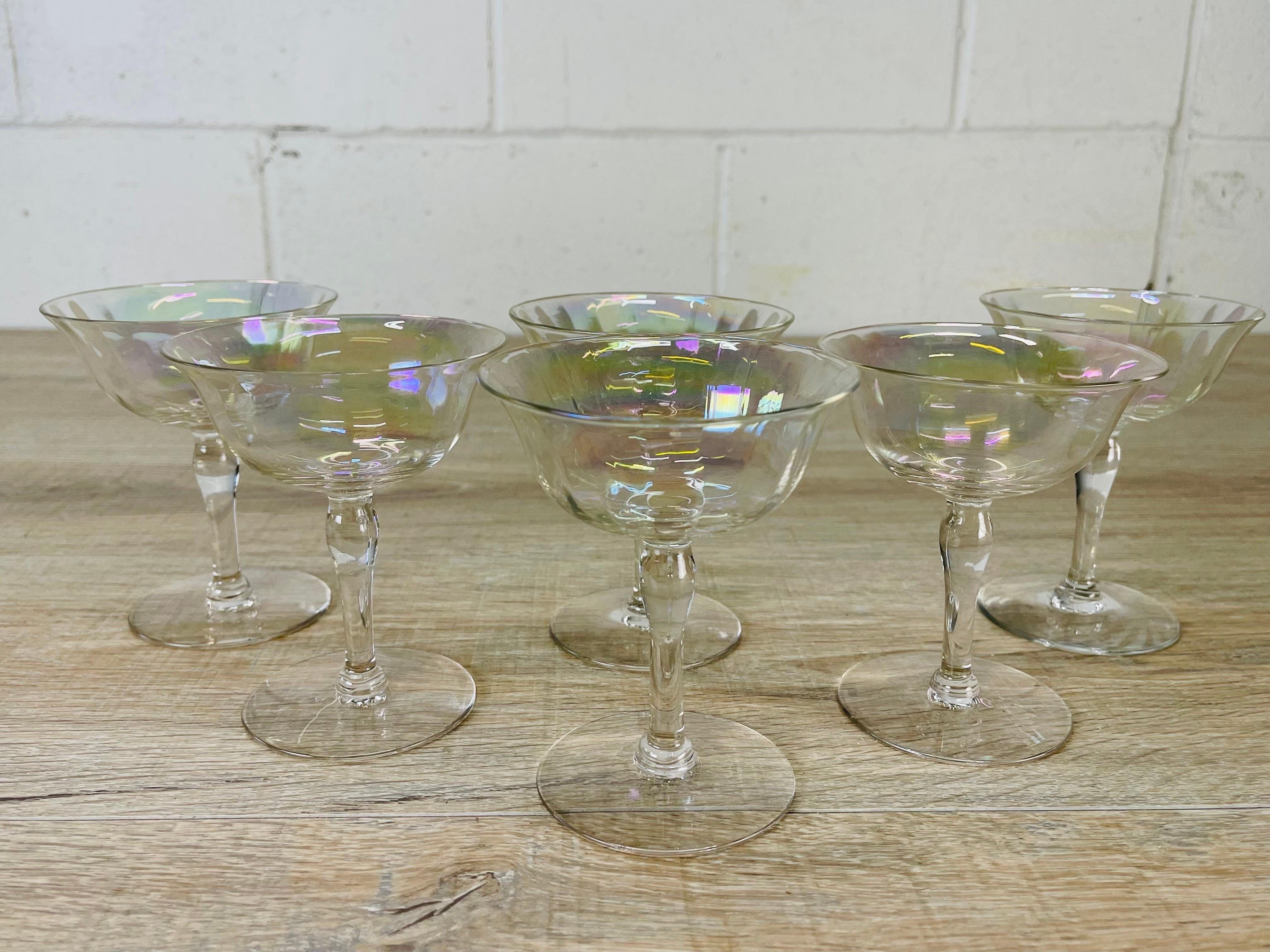 Vintage 1960s set of six iridescent glass coupe stems. No marks.