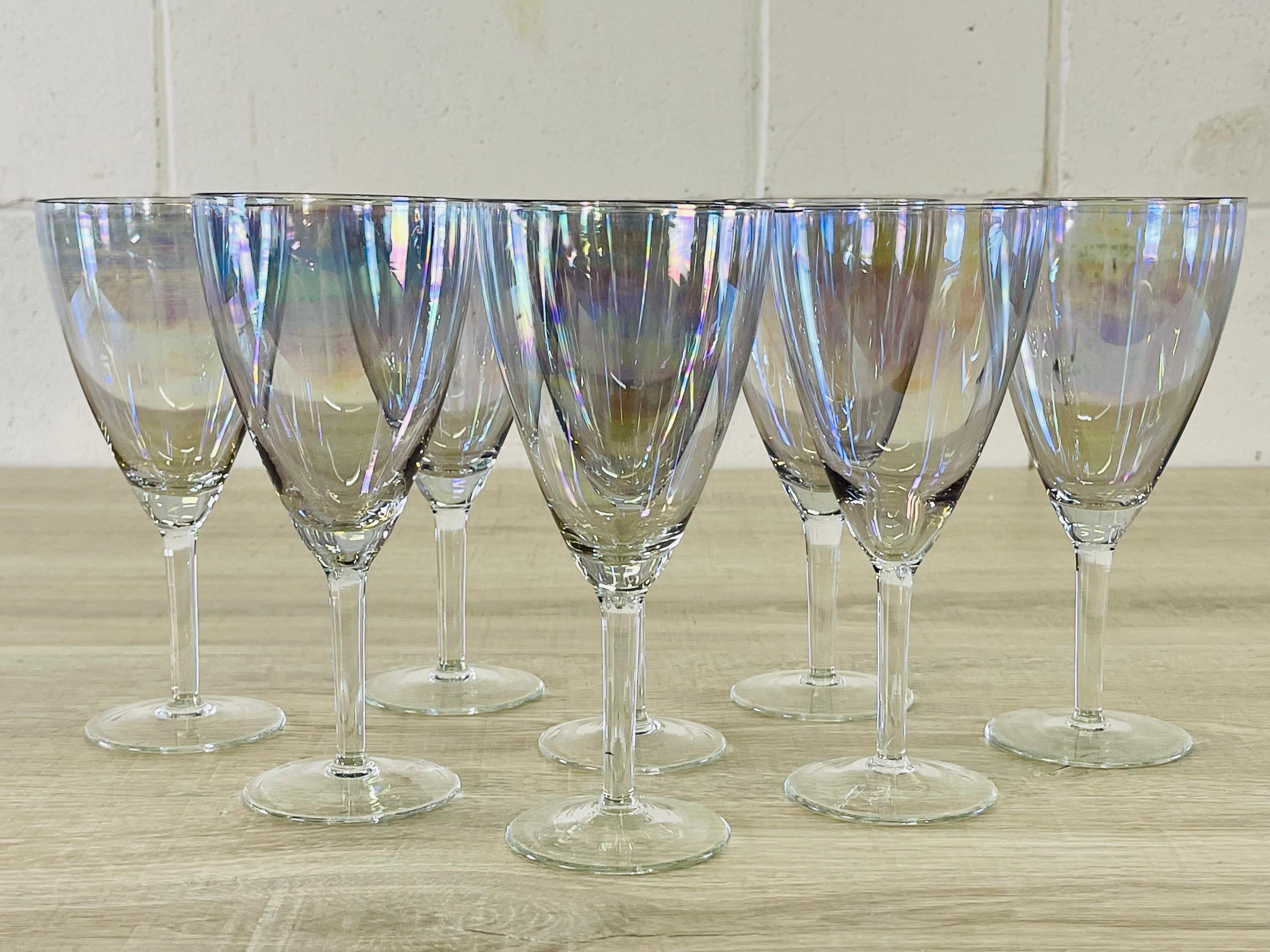 Vintage 1960s set of 8 iridescent glass water stems. No marks.