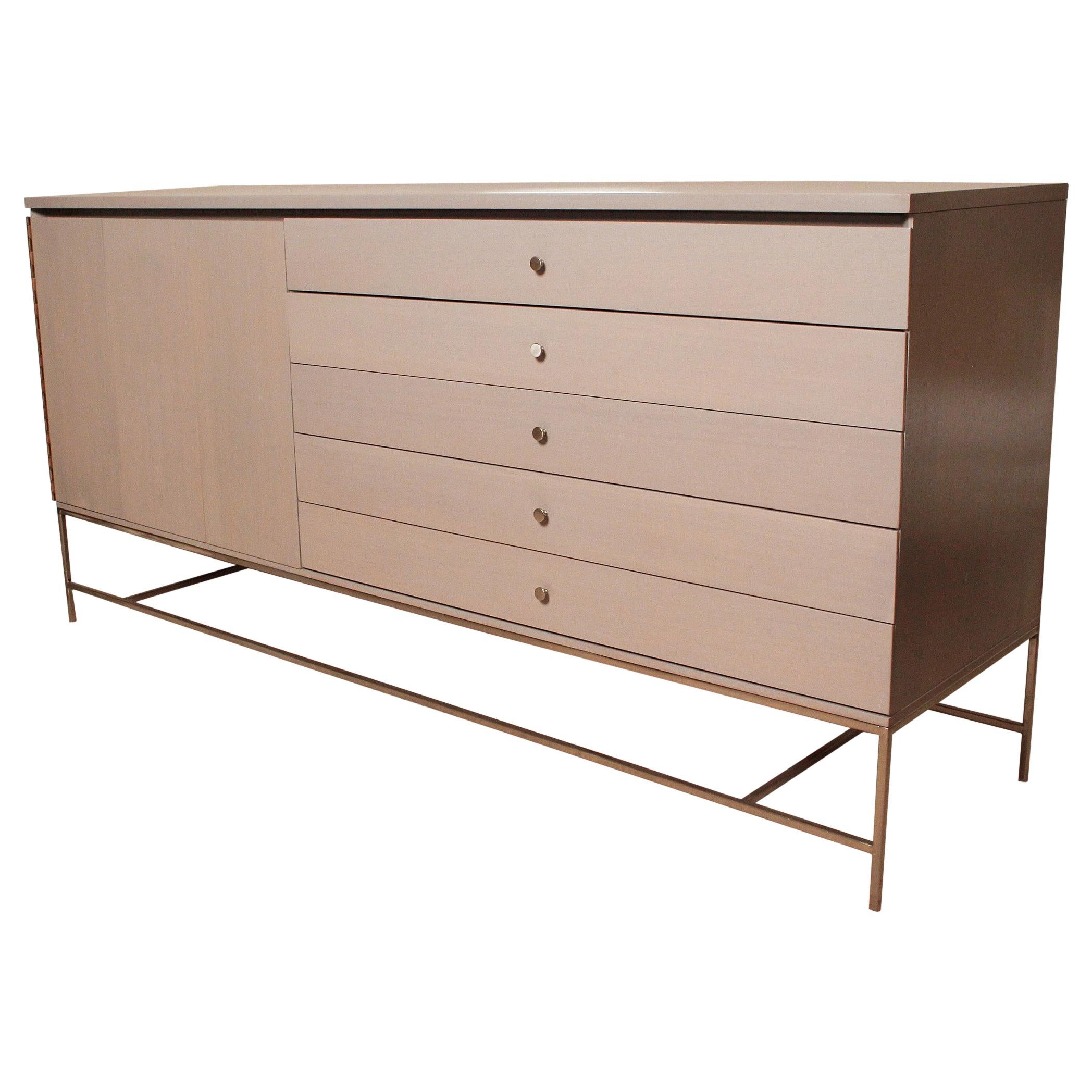 1960s Irwin collection sideboard by Paul McCobb for Calvin furniture has an earlier grey custom finish with brushed nickel hardware.