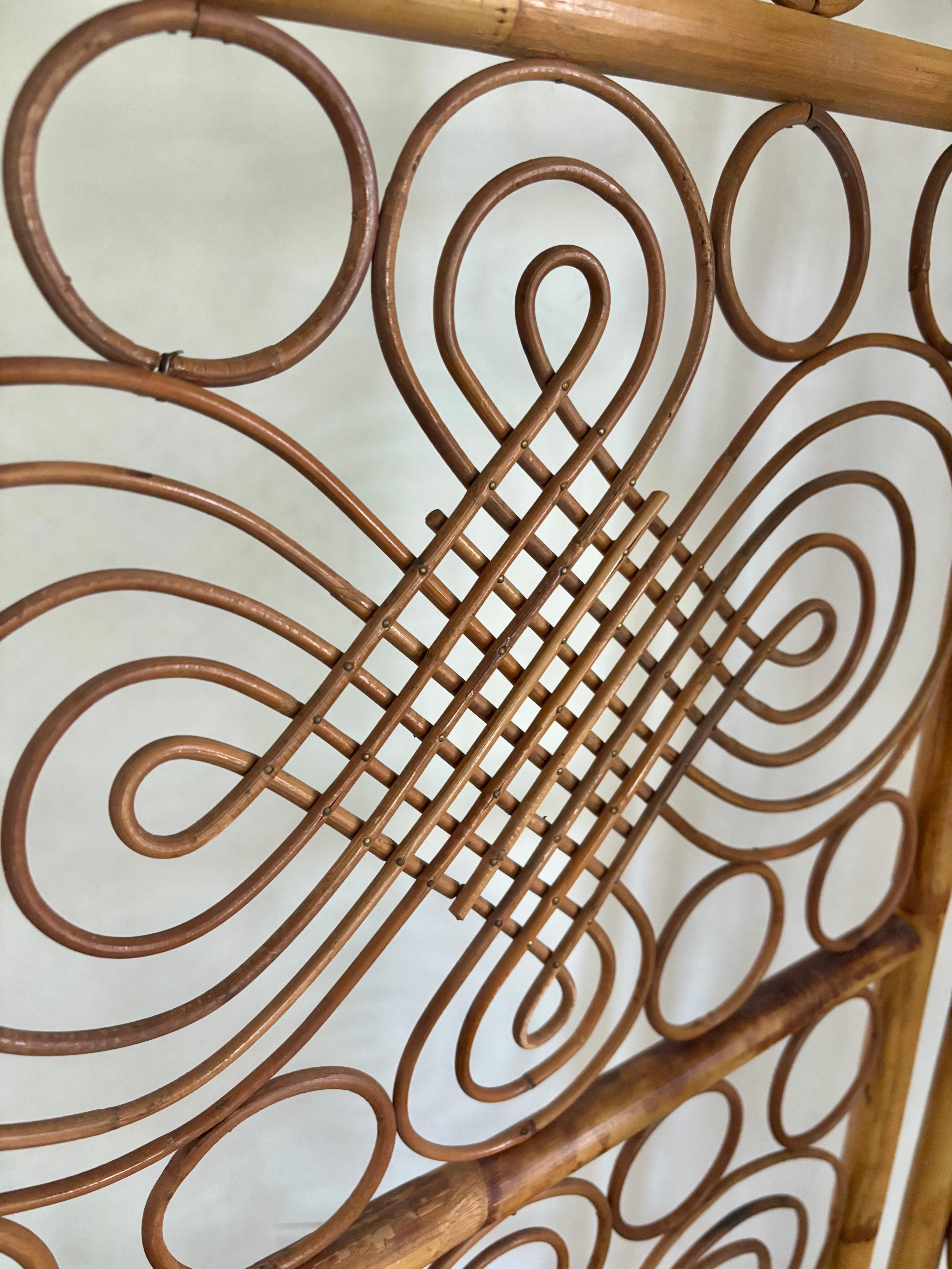 Exceptional French or Italian bamboo folding screen. 

Three panels of expertly crafted panels featuring a design of scrolling and lattice work reed pieces. Creating an intricate but airy light design. Sure to add life and interest to any room.