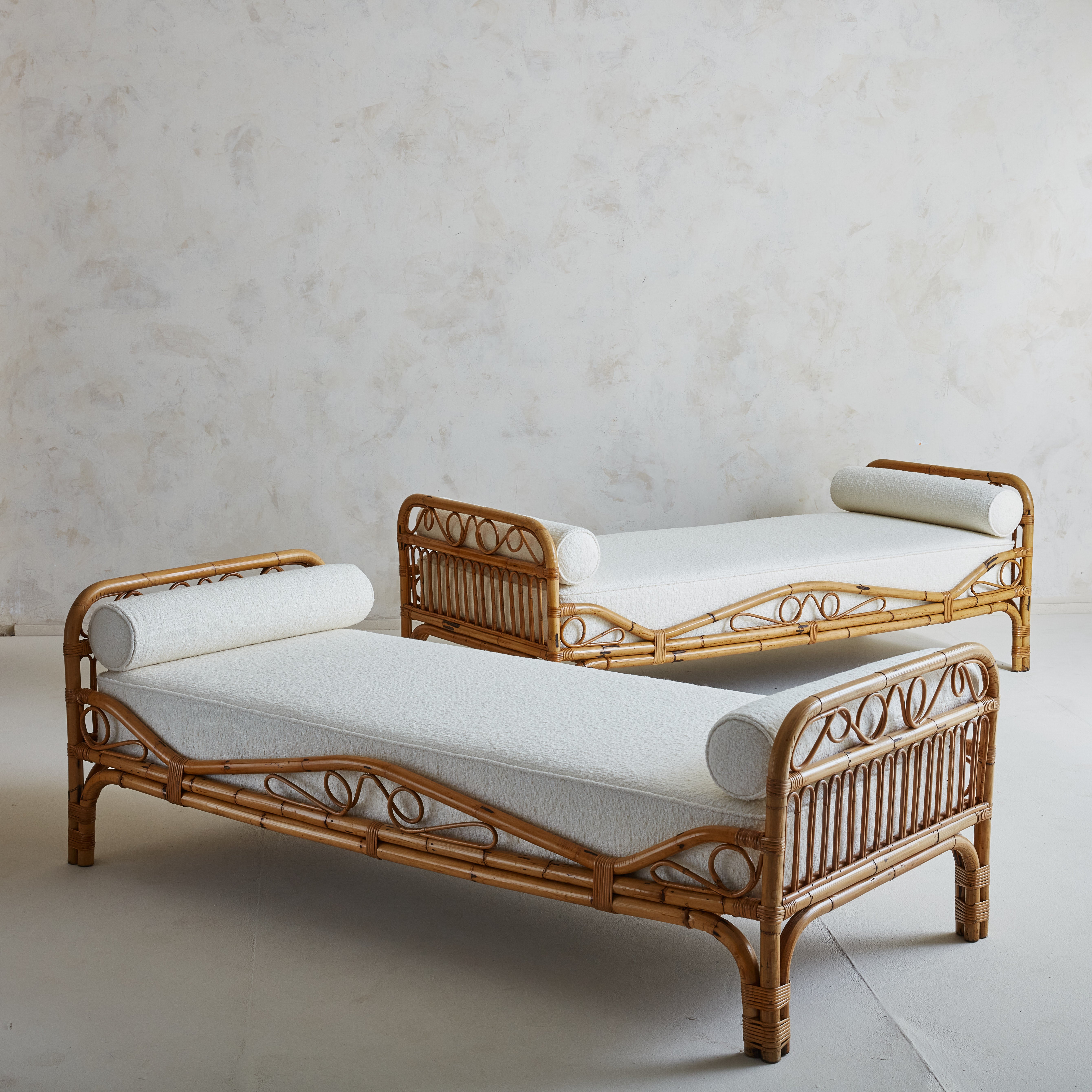  A comfy + elegant Italian Bamboo daybed sourced in Northern Italy. The bamboo structure is formed made by steam bending and is an Italian technique employed by  mid-century Italian designers such as Tito Agnoli and Franco Albini. This features a