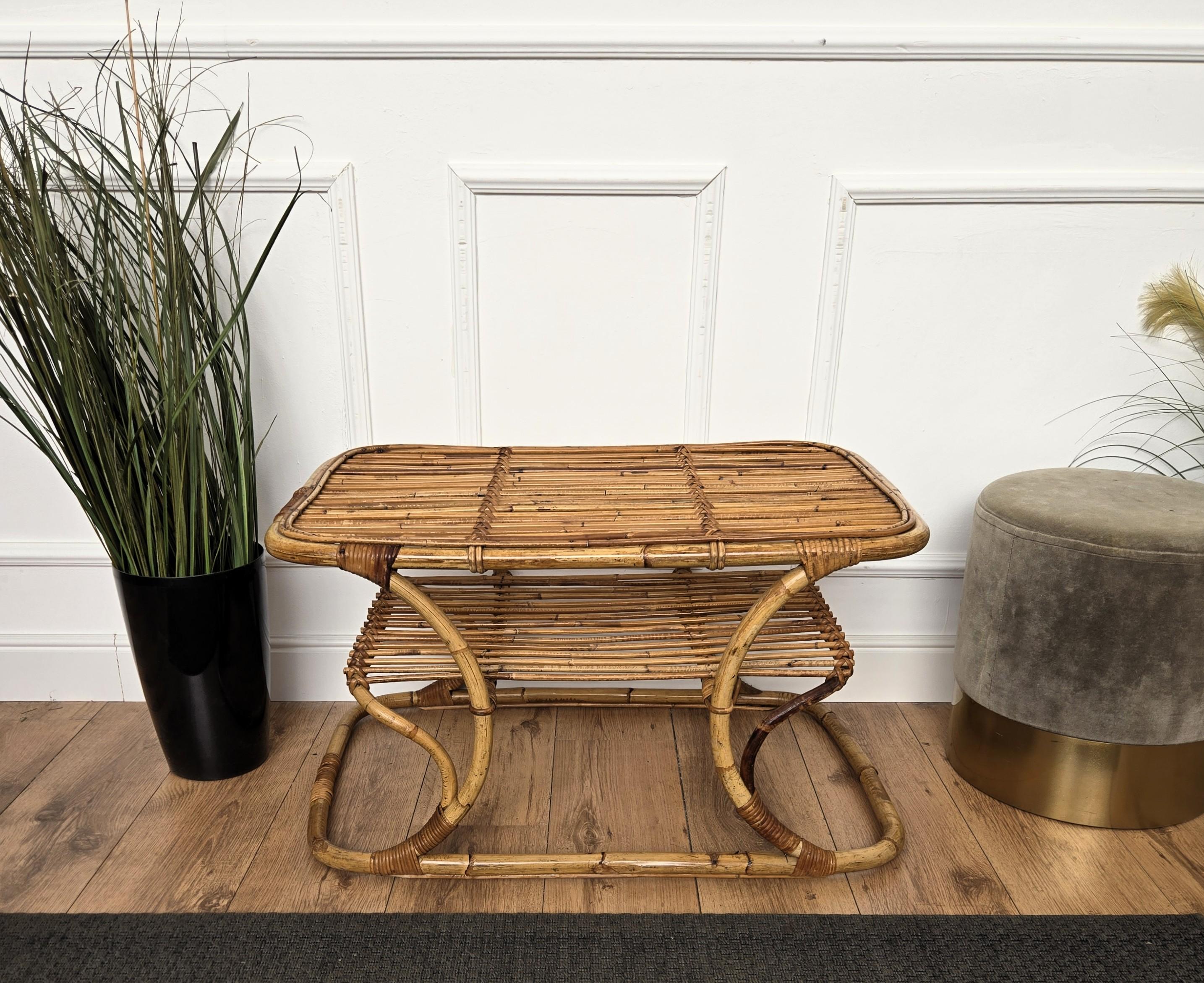 Beautiful 1960s Italian Mid-Century Modern side accent or coffee table. This charming piece is in the typical style of Tito Agnoli, Bonacina, Audoux and Minet where the organic beauty of the woven materials is timeless and classic, making bamboo and