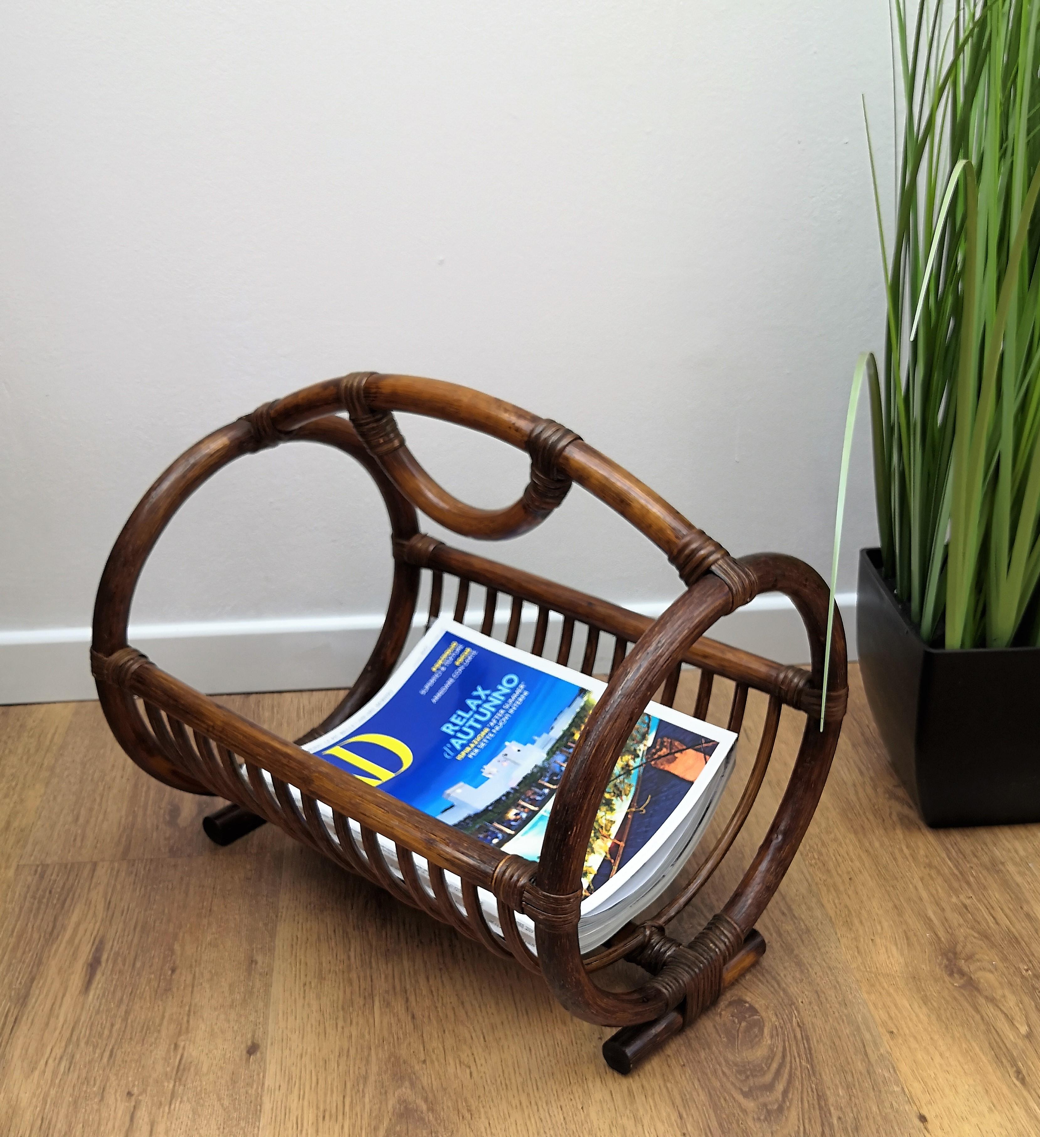 Beautiful 1960s Italian Mid-Century Modern magazine rack stand in bamboo. The organic beauty of the woven materials is timeless and Classic, making bamboo and rattan furniture incredibly versatile. It’s equally at home on an airy casual porch or in