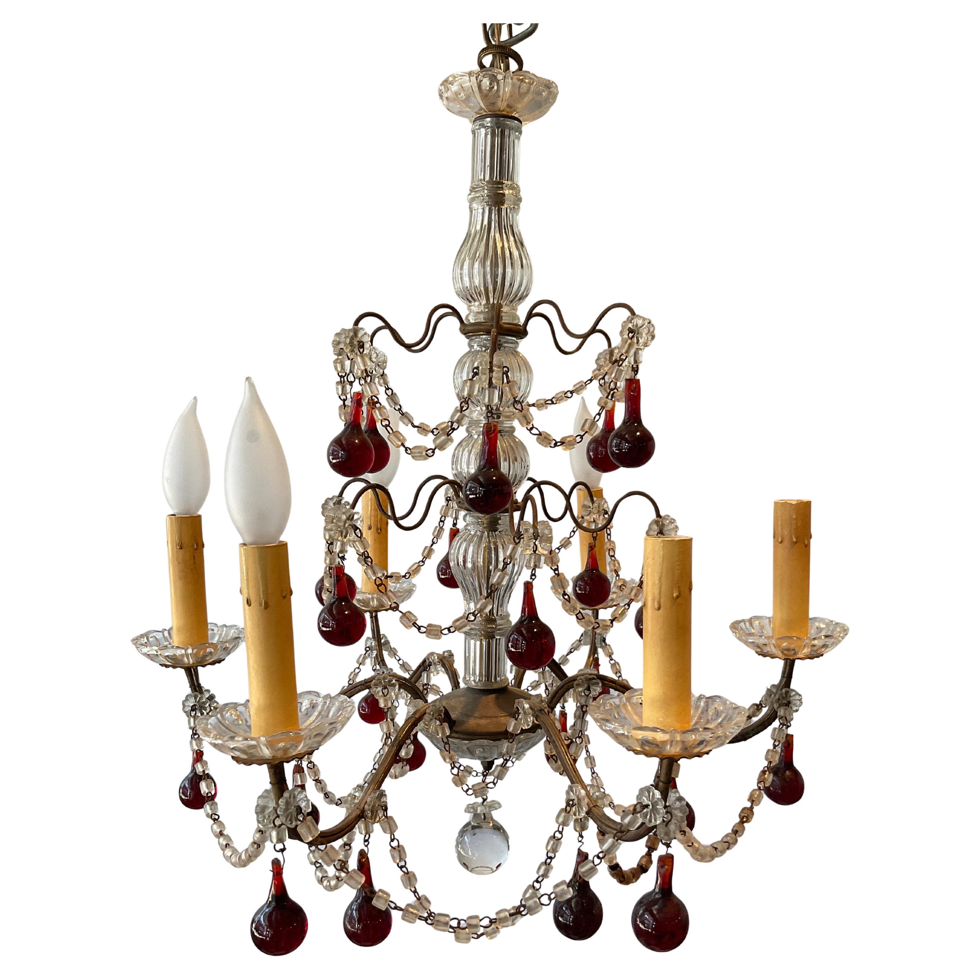 Lampadario italiano anni
60 con perline e gocce d
ambra