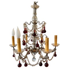 Lampadario italiano anni
60 con perline e gocce d
ambra