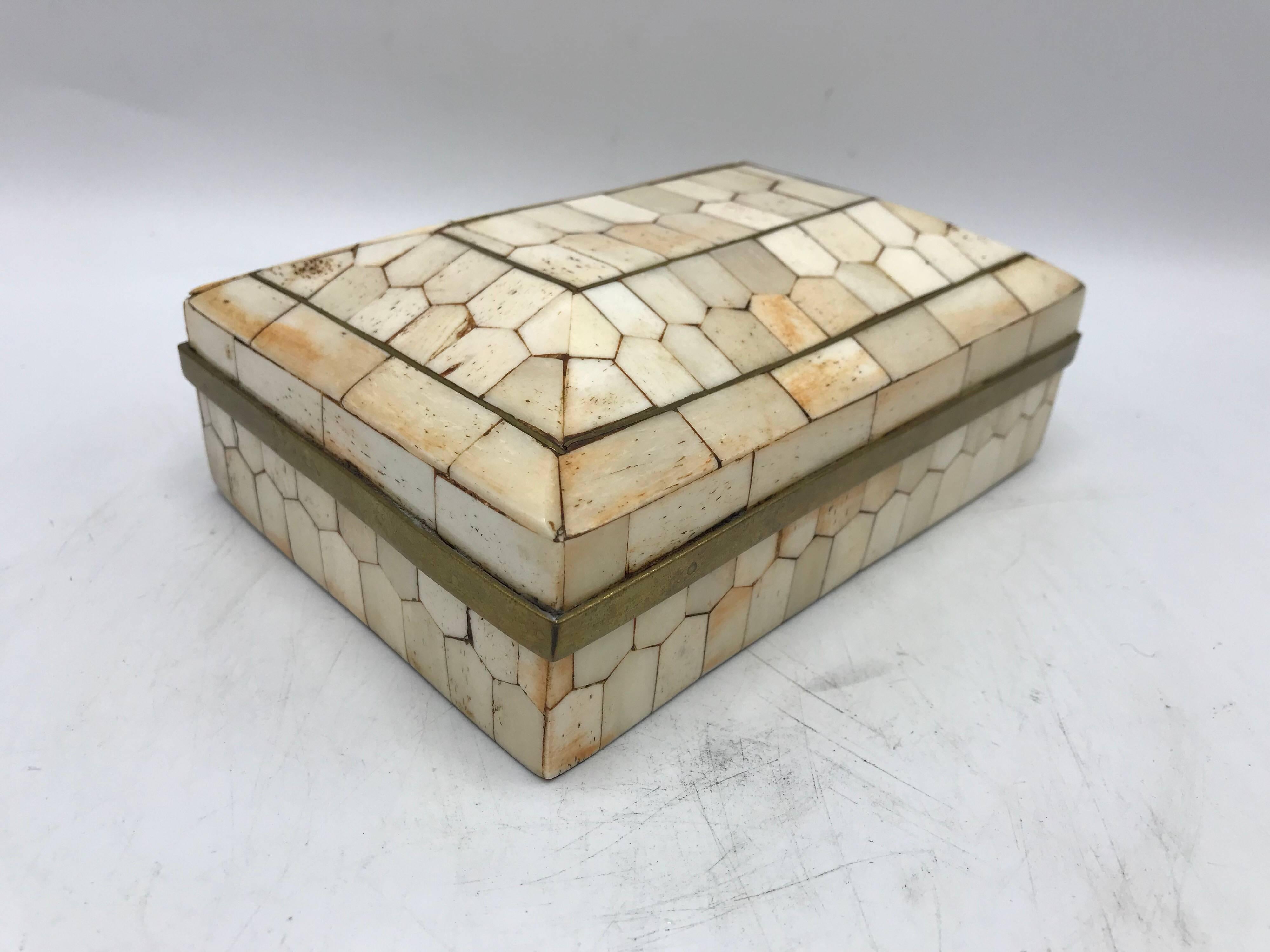 Listed is a fabulous, 1960s Italian bone and brass inlaid box. The piece has a unique interior, please see photo 6. Heavy.