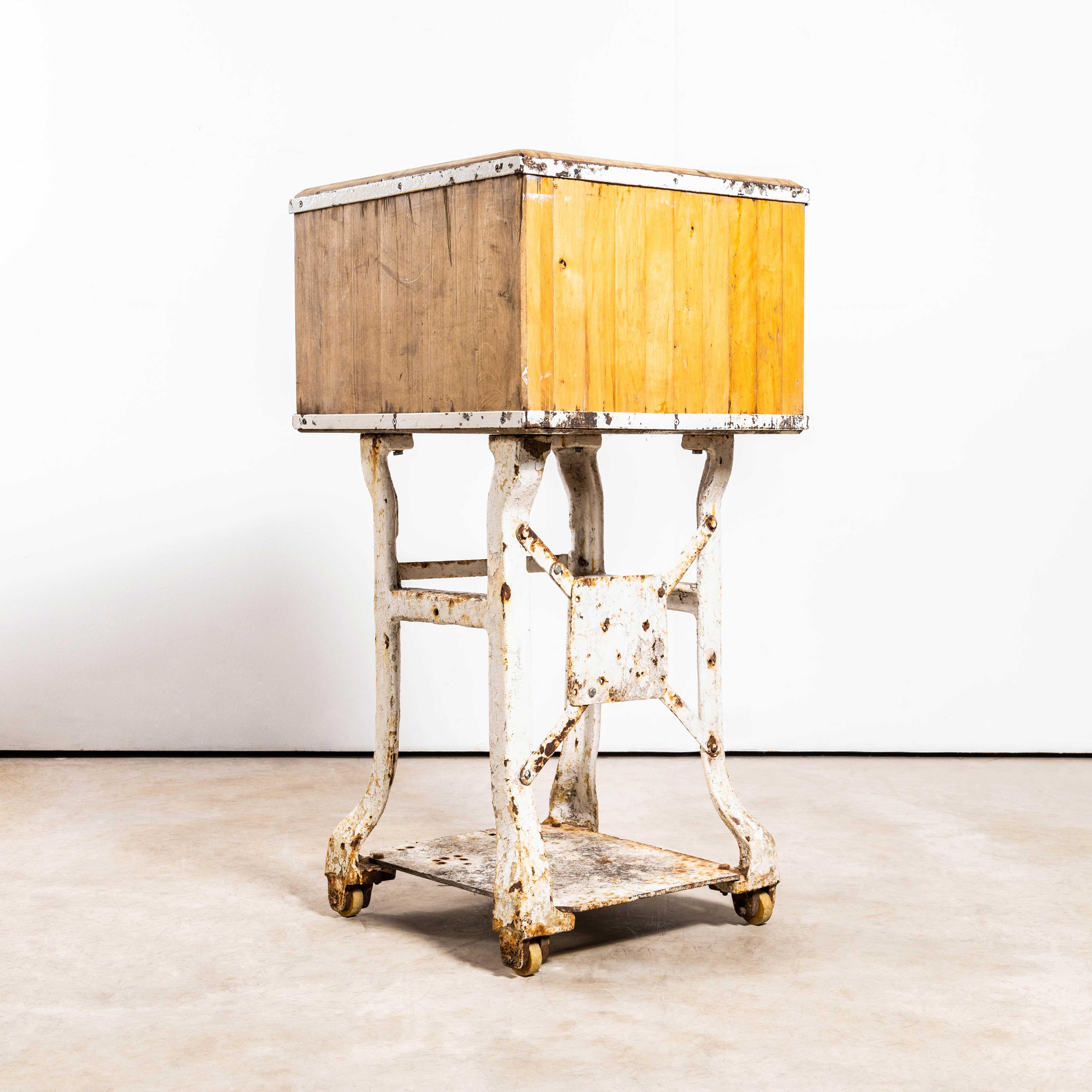 1960's Italian Butchers Block By Joko - With Cast Base. 

Unusual and very interesting mobile butchers block. The base is made with cast metal legs bolted to a solid steel base and various supports. The butchers block is solid hornbeam in excellent