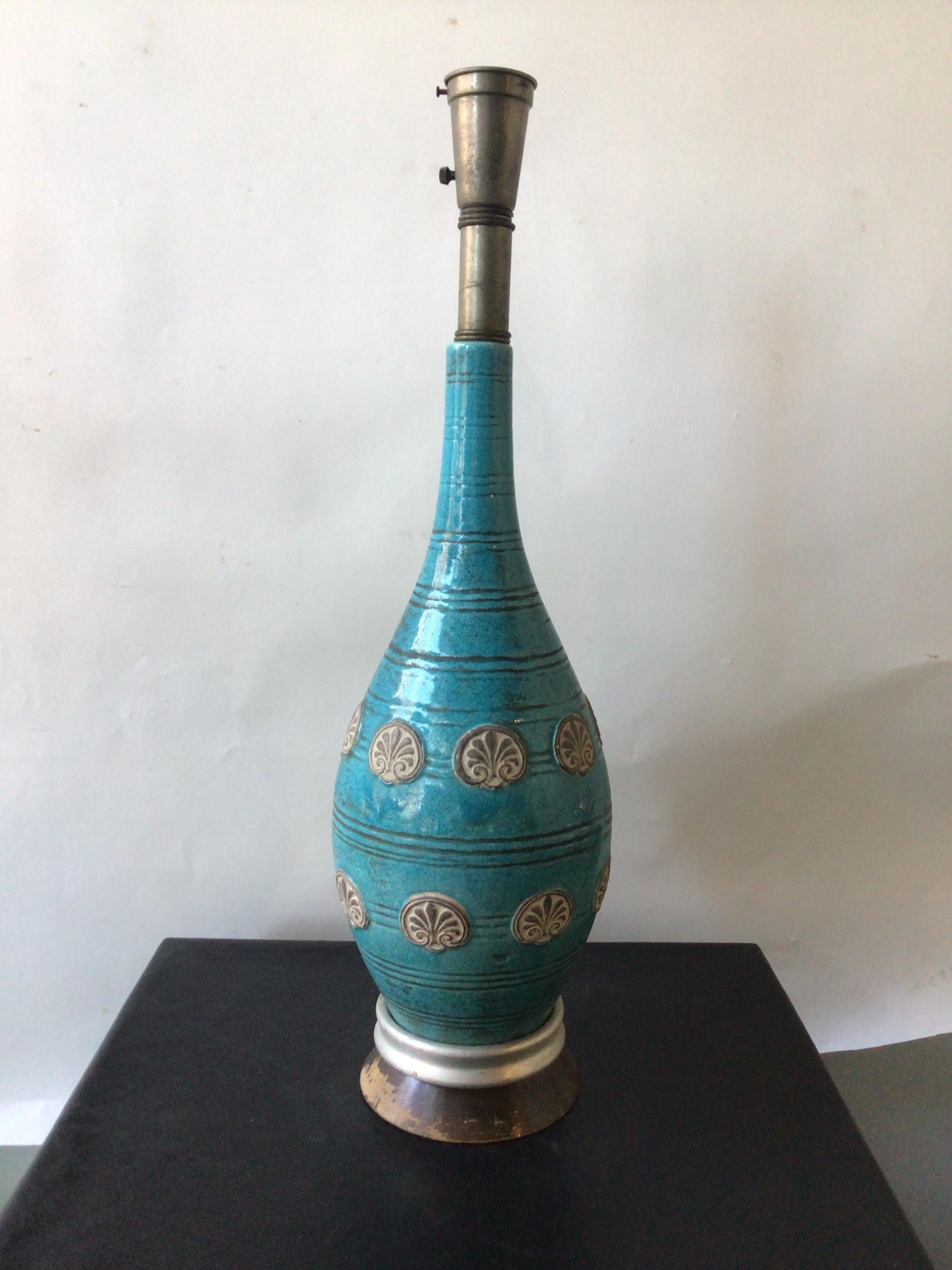 1960s Italian ceramic ,aqua lamp. Wood base.