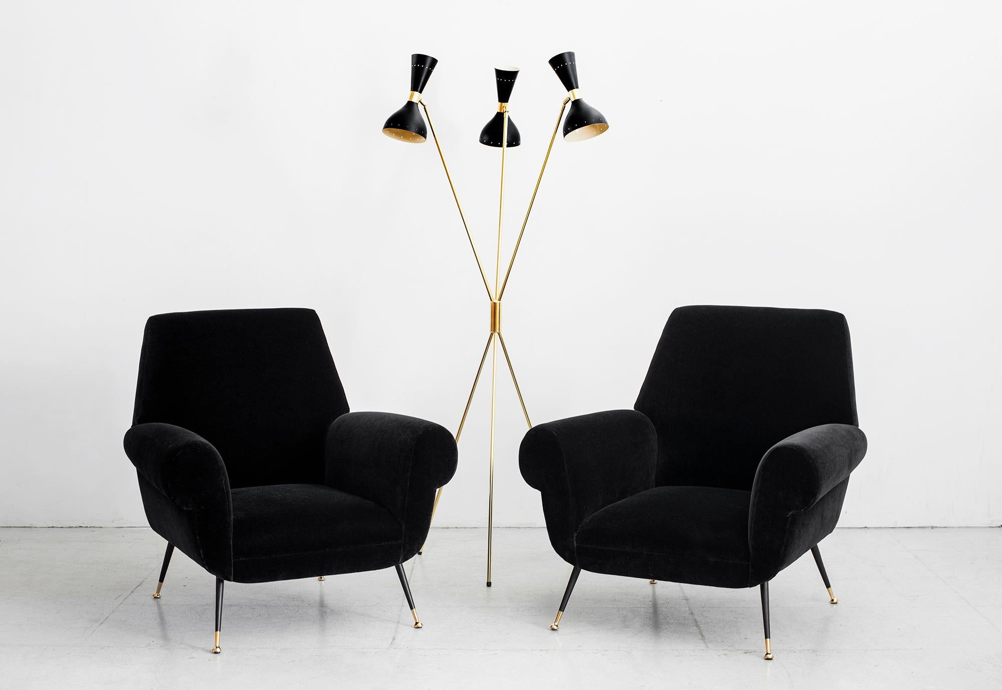 Gorgeous Italian 1960s club chairs in the style of Marco Zanuso newly upholstered in black mohair with
polished brass legs.
Fantastic large scale and shape.