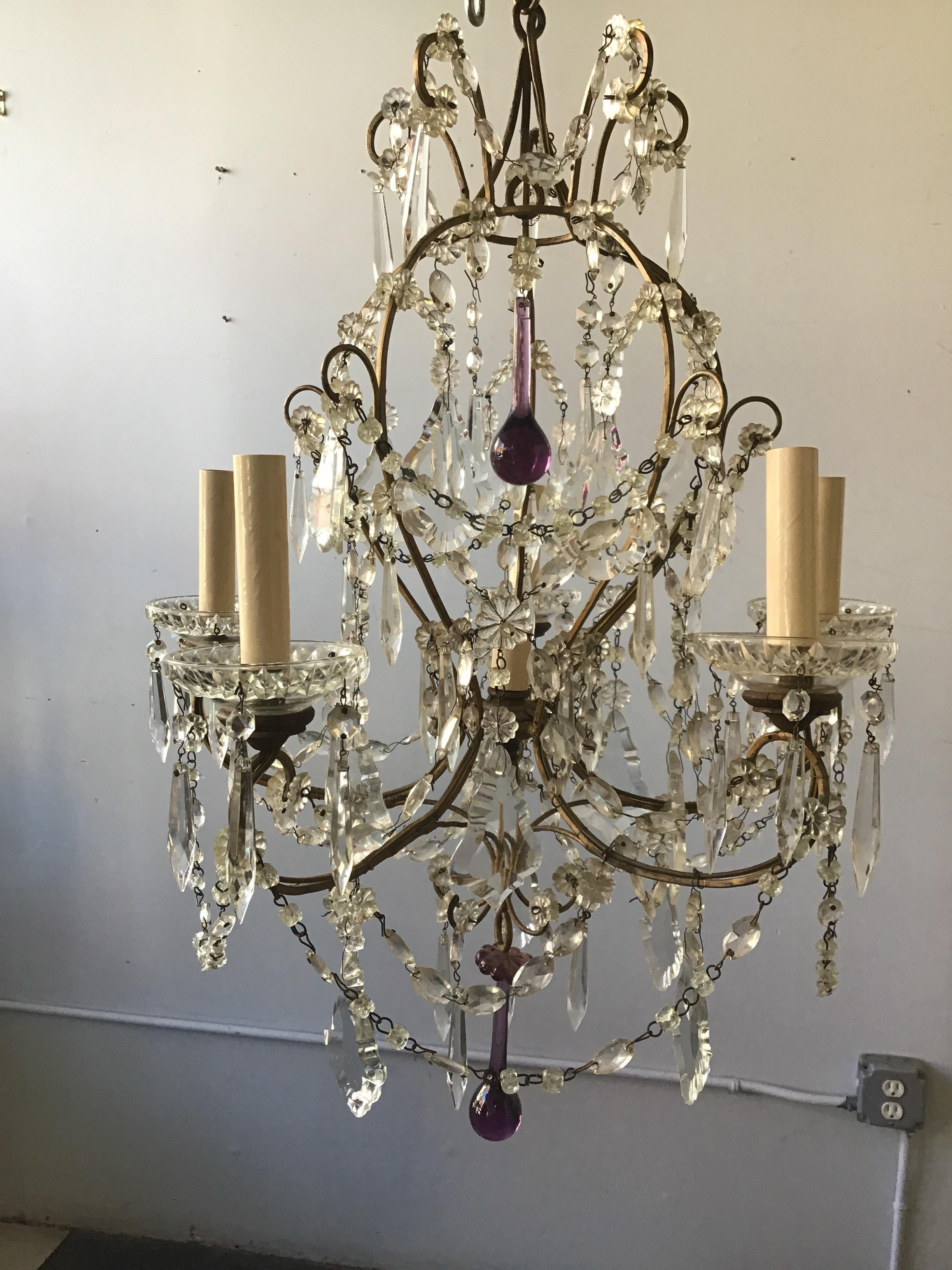 1960s Italian crystal chandelier. Iron frame. A few crystals missing.