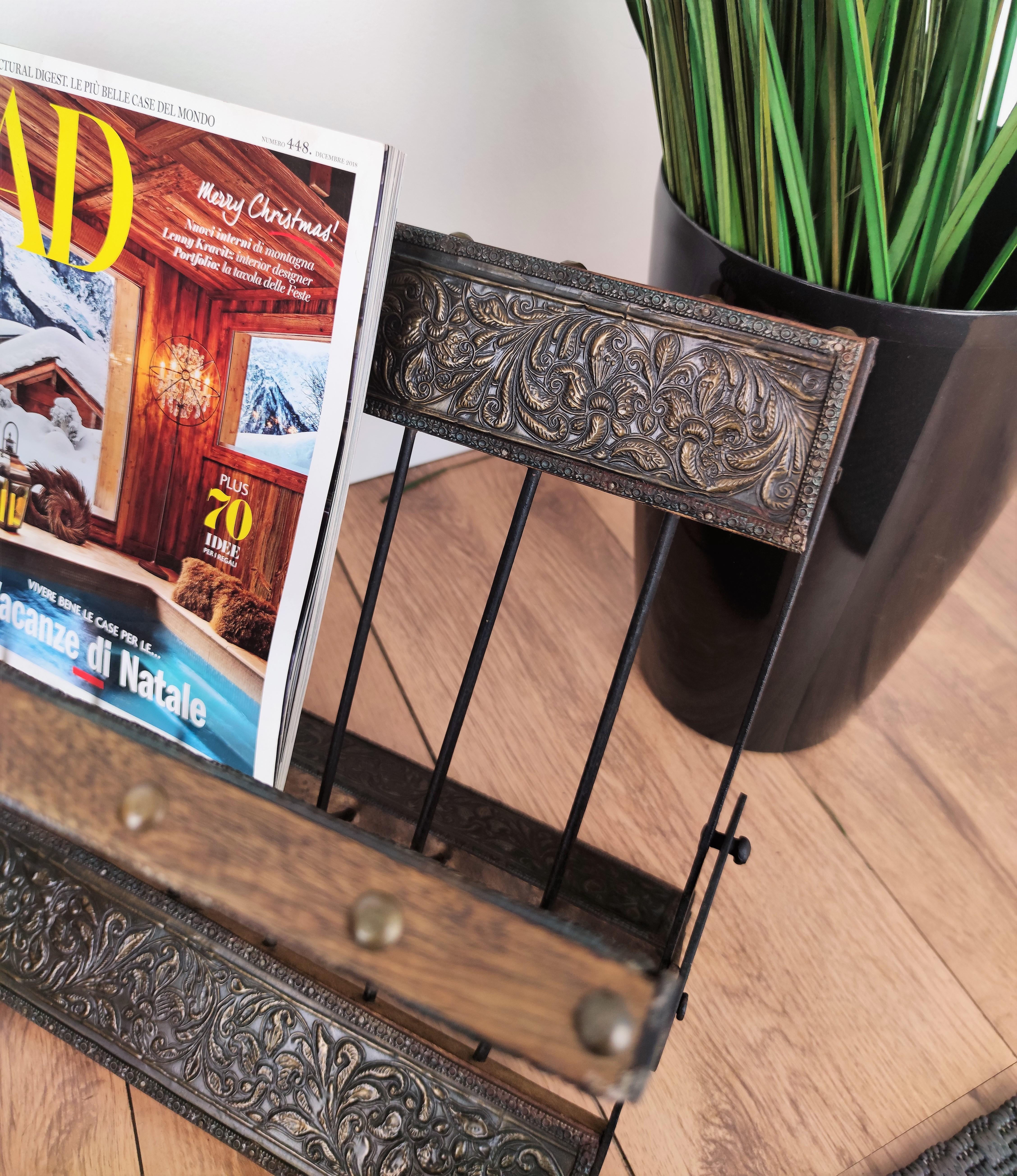 Beautiful and stylish Italian decorated brass magazine stand or folio rack dated around the 1950s. A great piece that perfectly adds to every home decor, in great conditions with a fantastic patina and vintage feeling of the wear and use on the