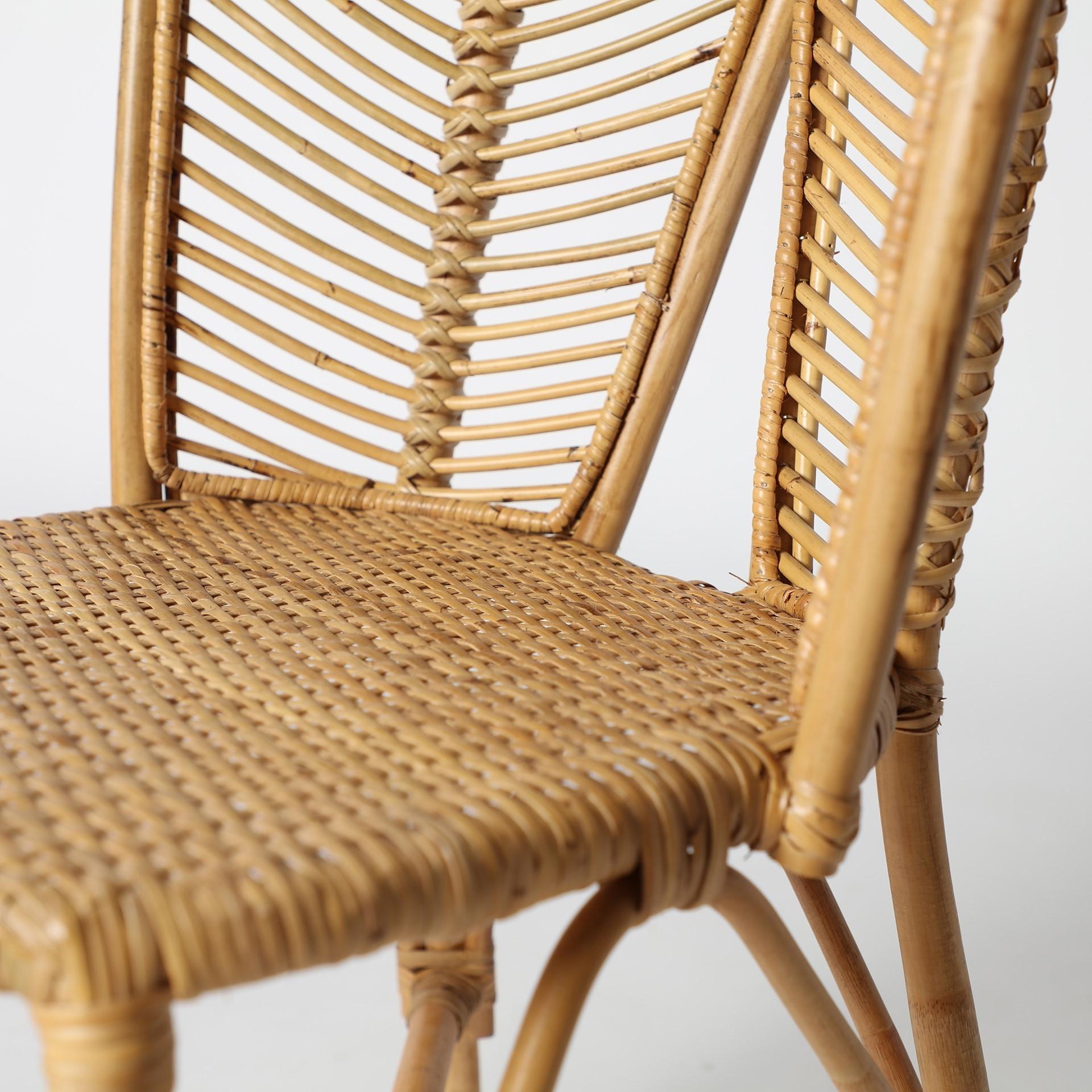 1960s Italian Design Style sculptural and gorgeous chair all in rattan and aerial structure with handbraided rattan wicker seat.