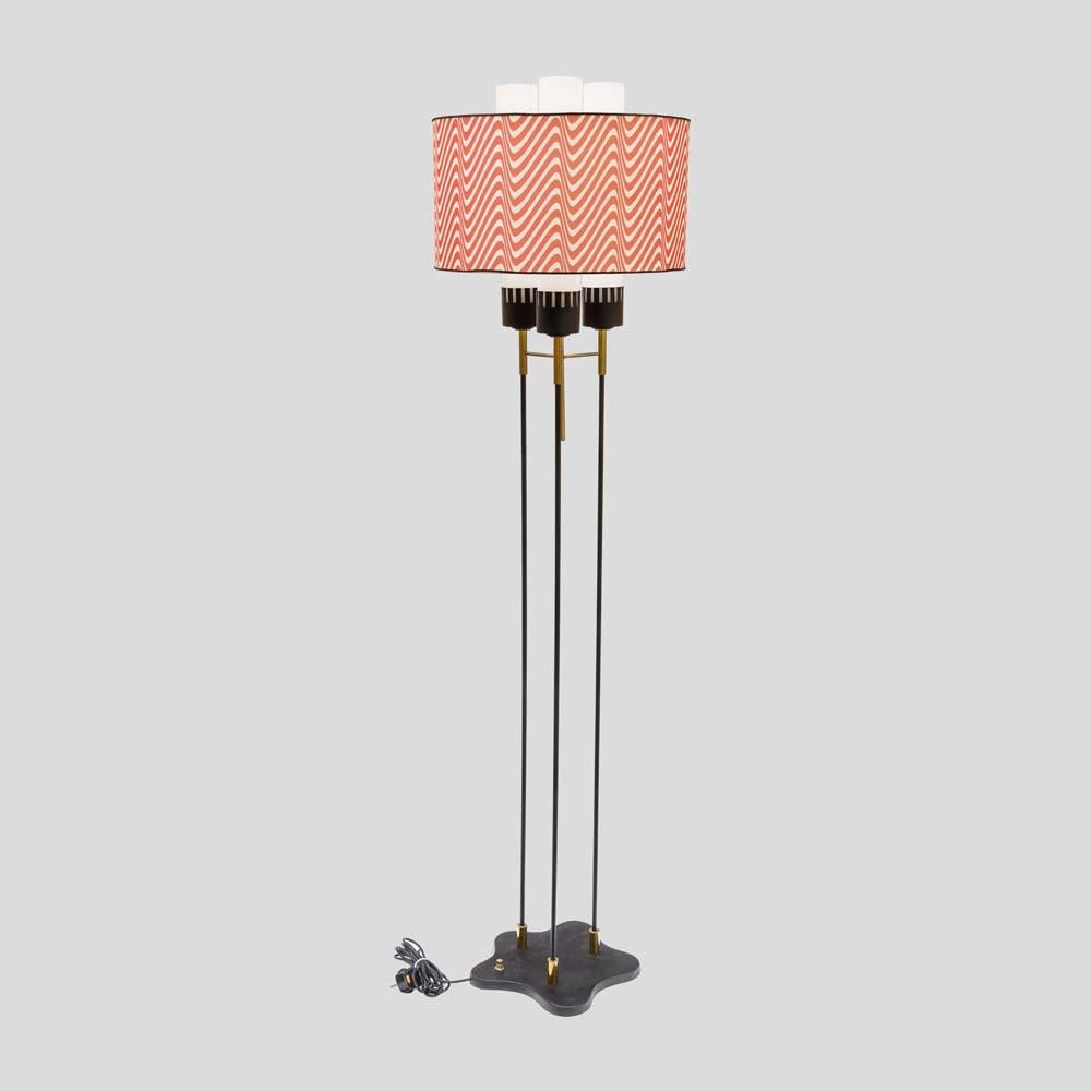 1960s Italian designed red white shade black enamelled floor lamp by Stilnovo
Pair available.

If you’re a fan of Midcentury Modern design, you’ll love this vintage floor lamp. Designed by Stilnovo in the 1950s, this lamp is a beautiful example of