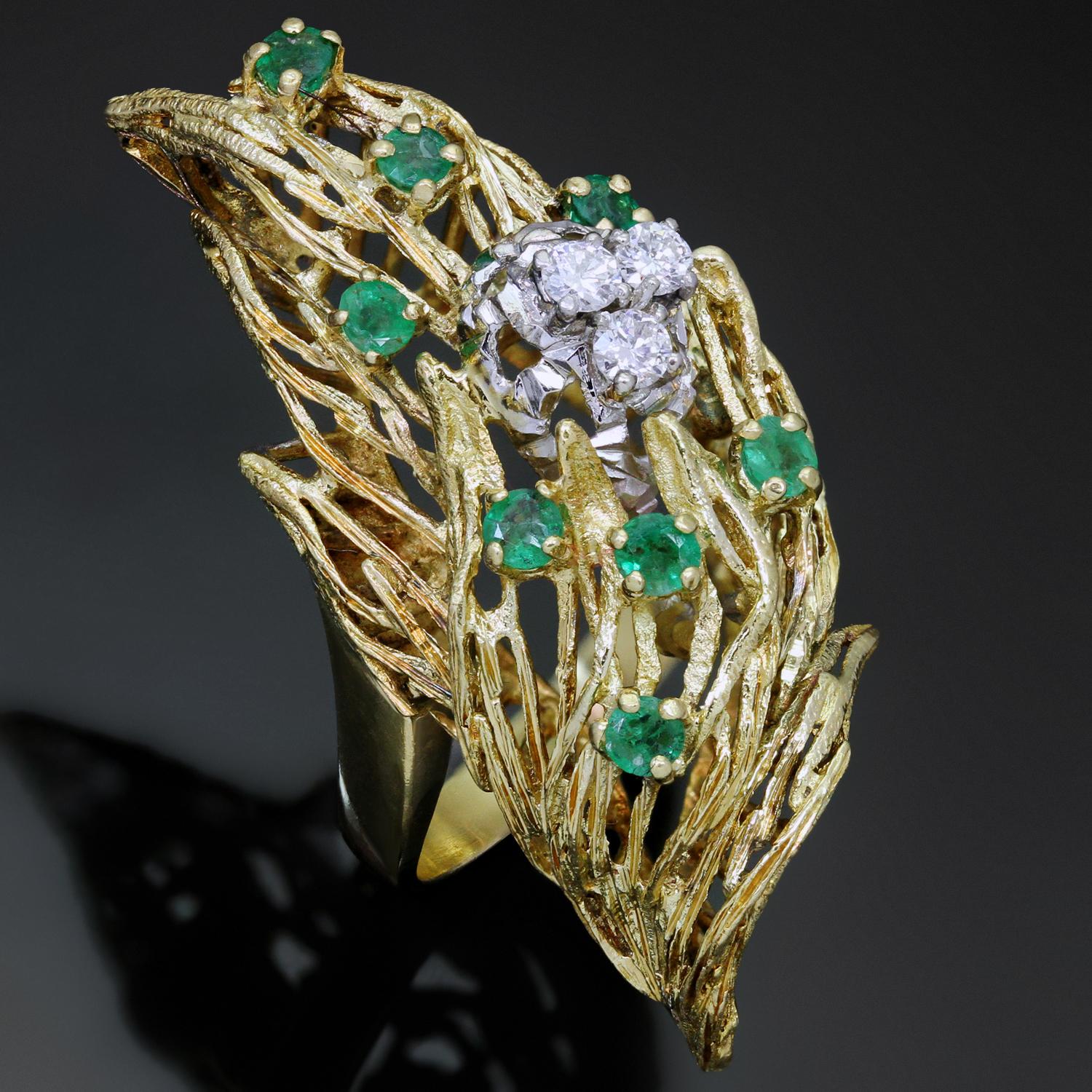 This gorgeous retro ring features a textured leaf-like design crafted in 18k yellow and prong-set with vibrant emeralds of an estimated 0.64 carats and sparkling brilliant-cut round diamonds of an estimated 0.30 carats. Made in Italy circa 1960s.