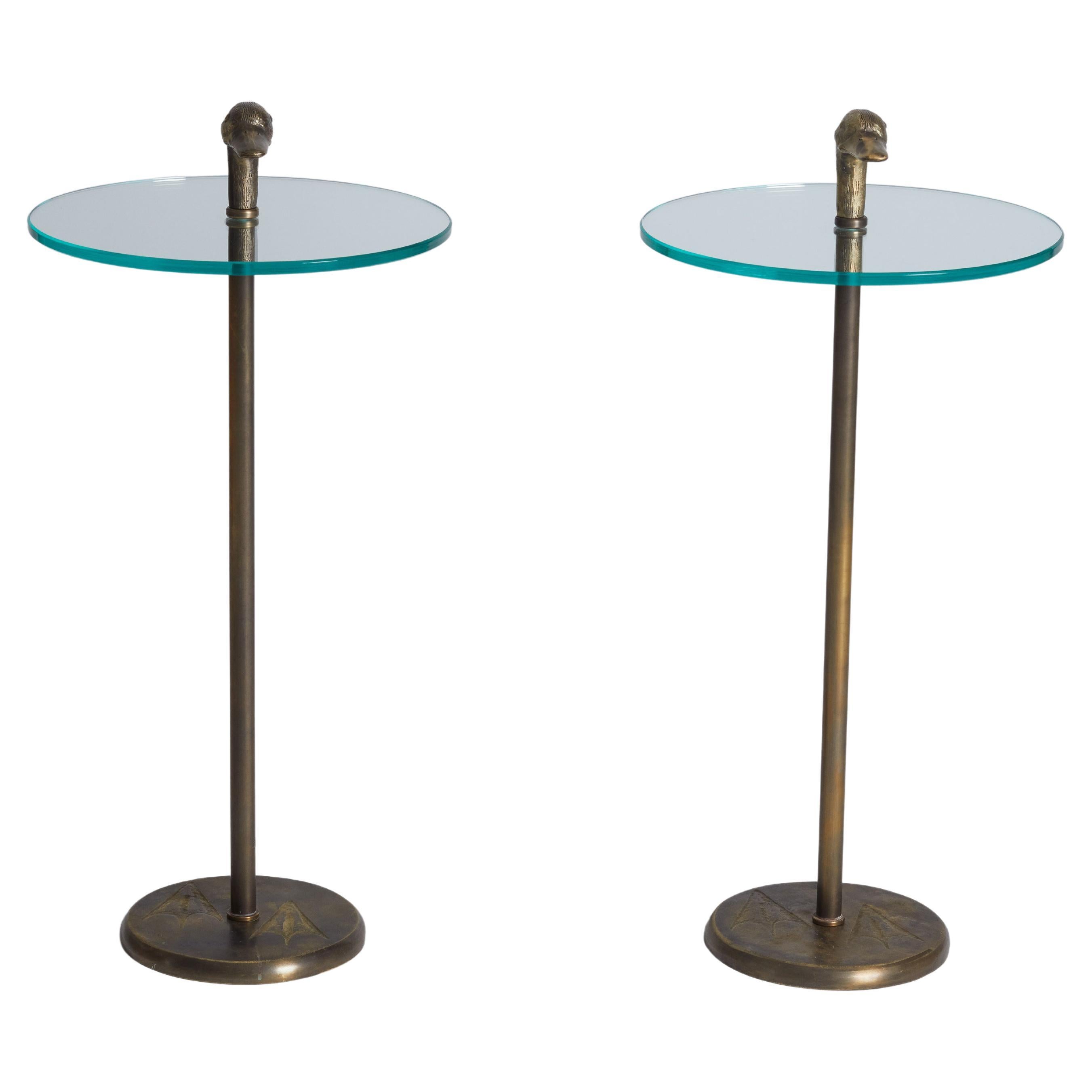 Pair of duck head tables with etched feet. Brass with glass top.