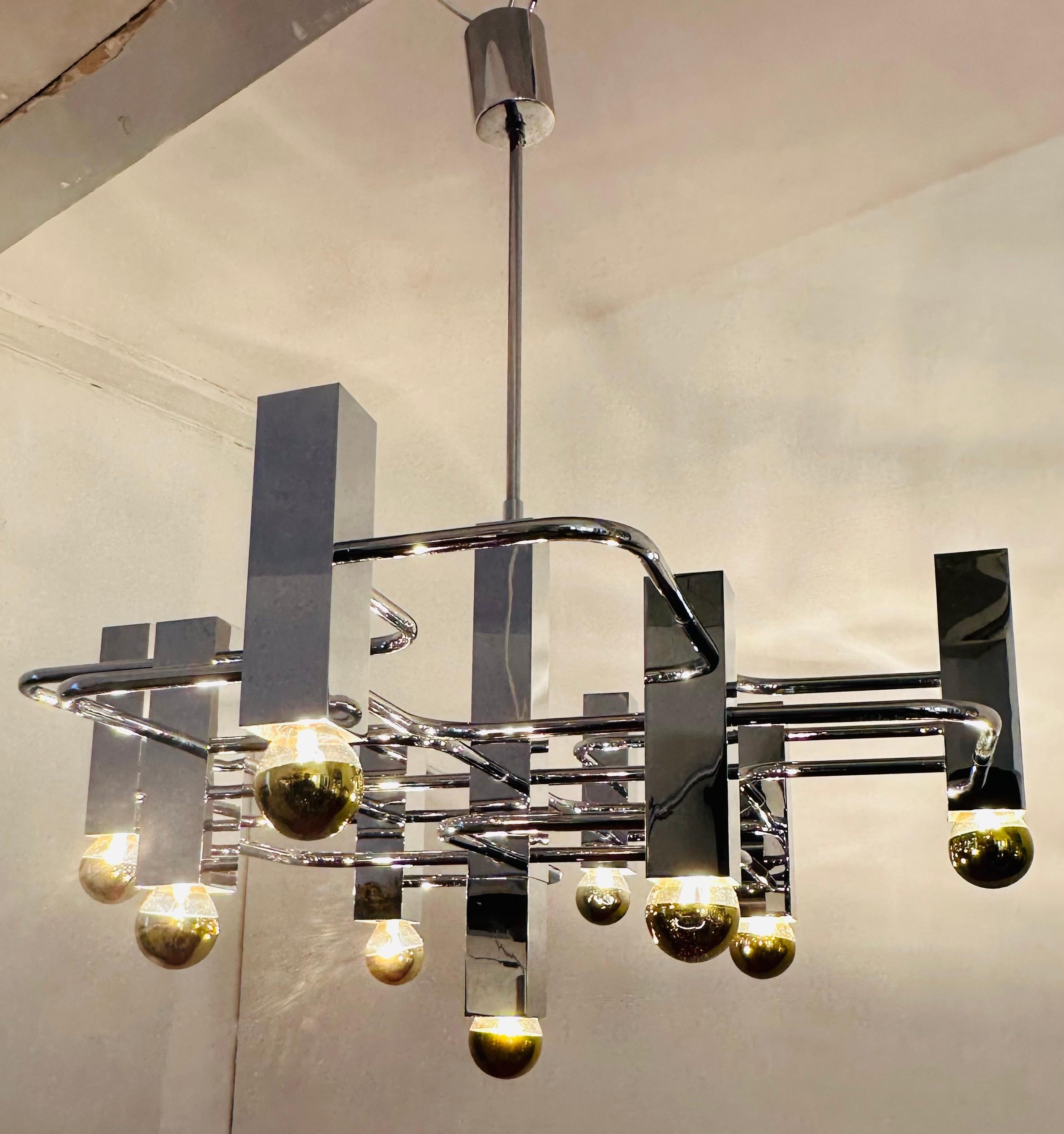 1960s Italian Gaetano Sciolari Geometric Polished Chrome Nine Light Chandelier In Good Condition For Sale In London, GB