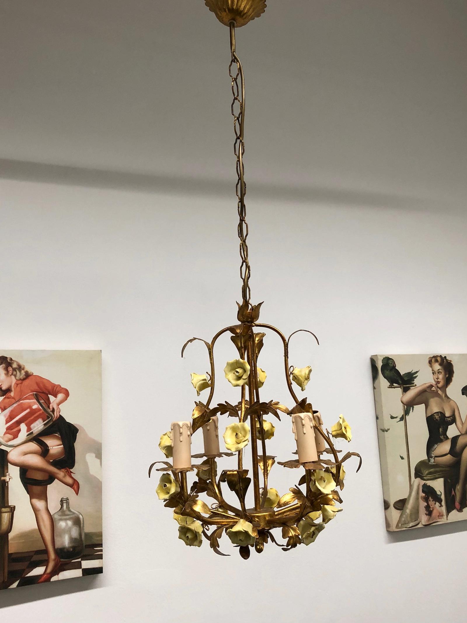 Add a touch of Italian opulence to your home with this charming chandelier! Perfect flowers, made of Majolica, to enhance any chic or eclectic home. We'd love to see it hanging in an entryway as a charming welcome home. The chain with canopy is