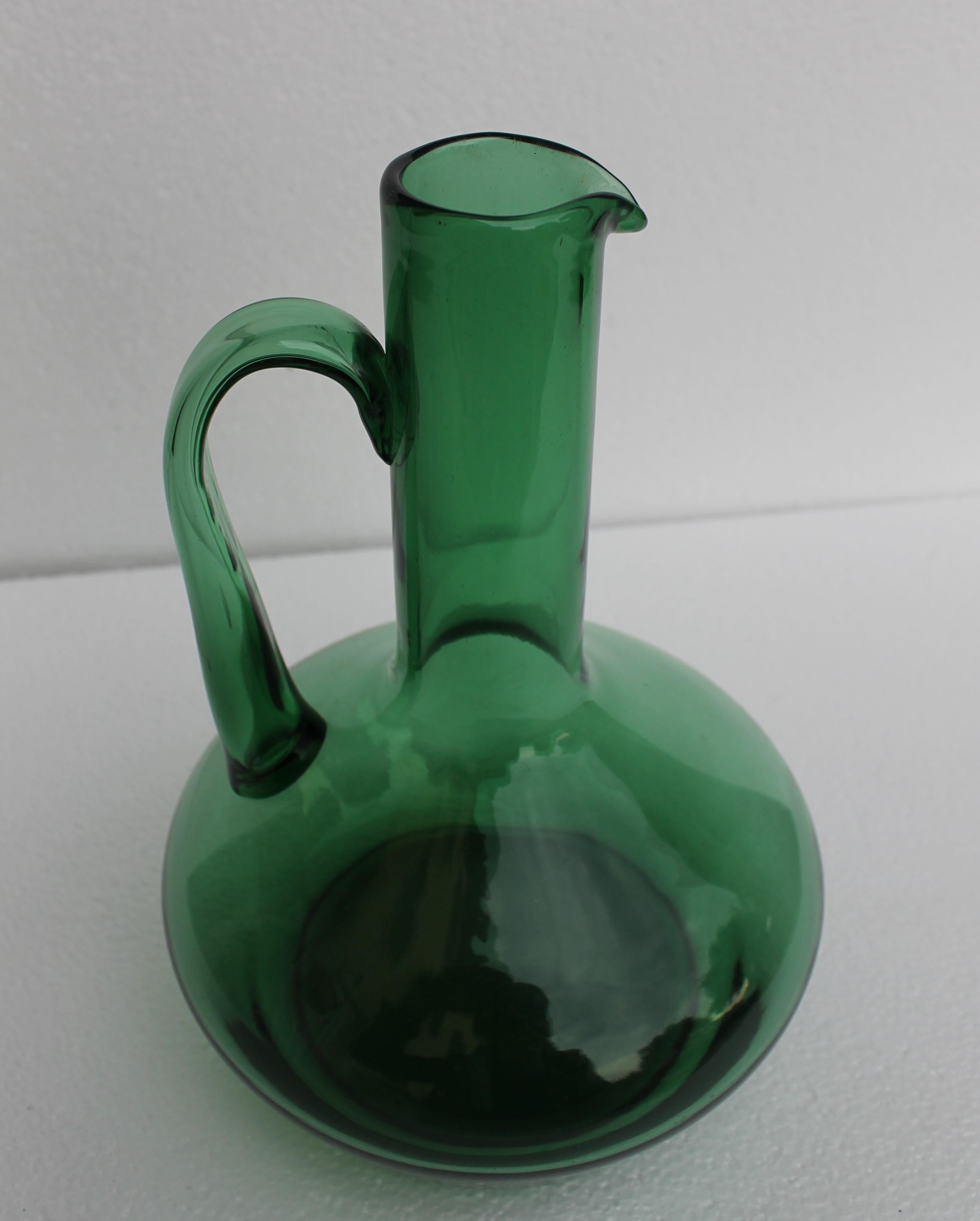 Green glass Pitcher, made in Italy, dated circa 1960.