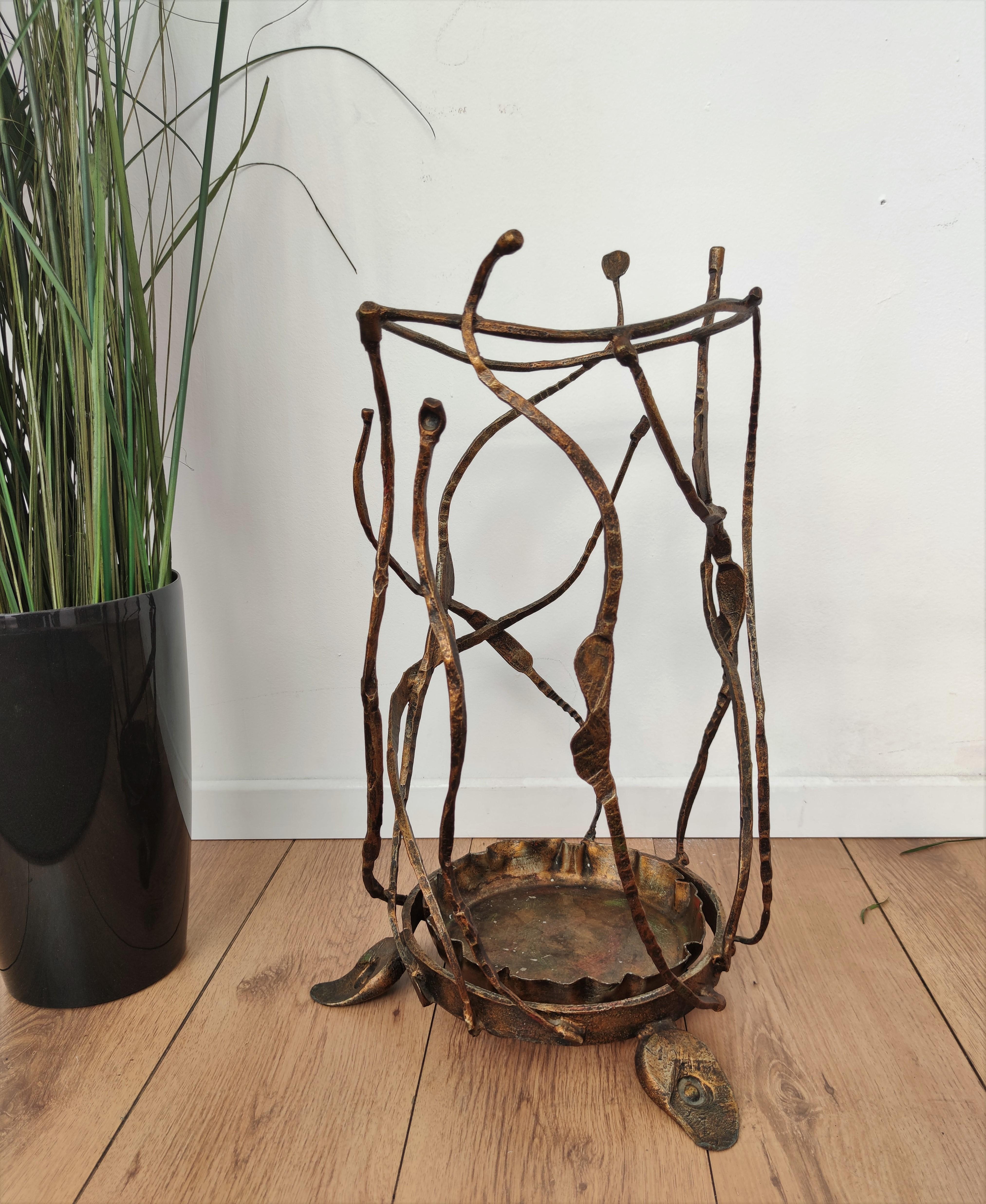 One of a kind Brutalist sculptural umbrella stand designed and handmade in wrought iron by the Italian artist Salvino Marsura, as signed on the bottom frame by the author.
   