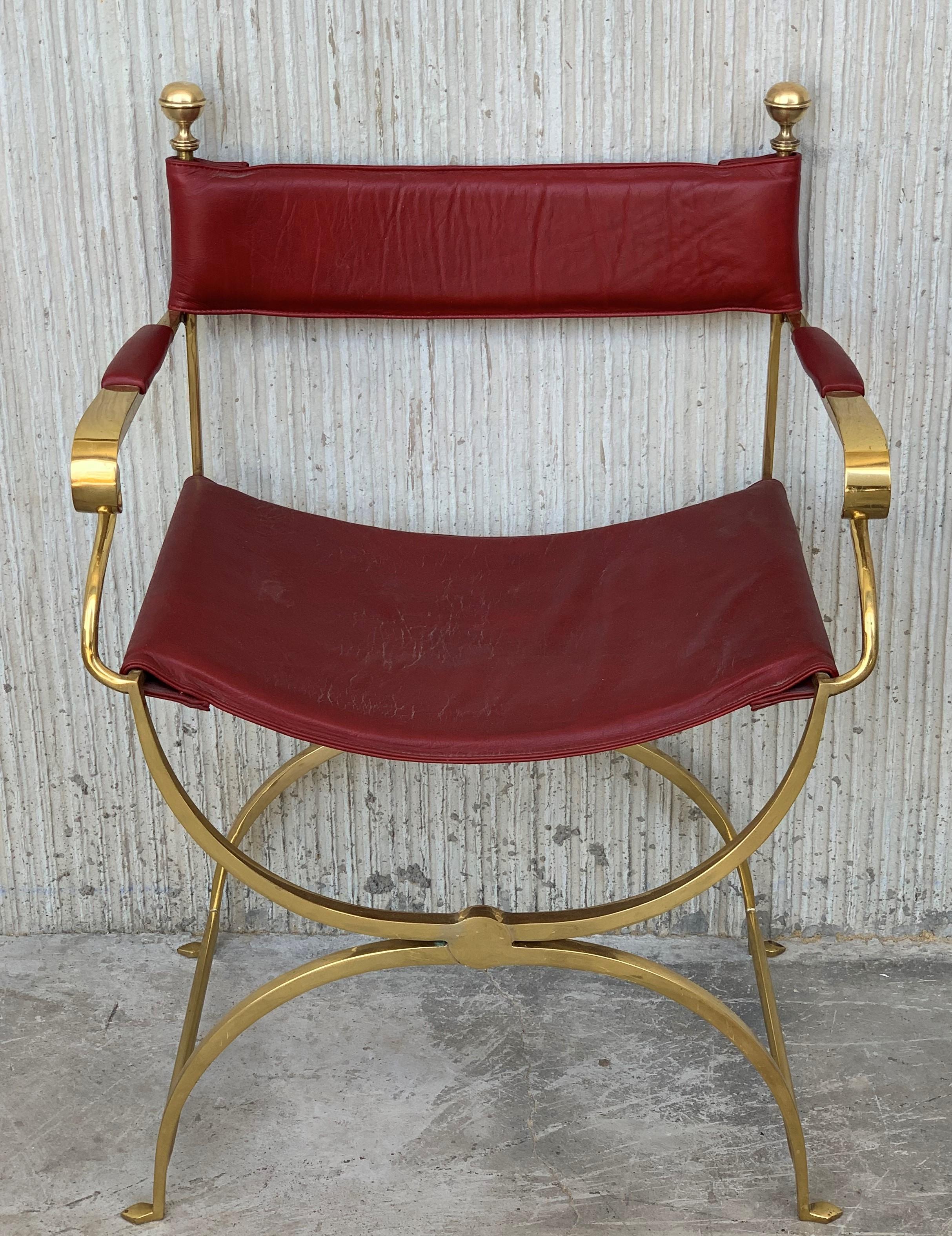Pair of beautiful 1980s Italian chrome gold and red leather Savonarola director's chair in perfect conditions, with very minor fading and great timeless patina.
Very comfortable armchair, quilted in back and seat.
Size: Height to the arm
