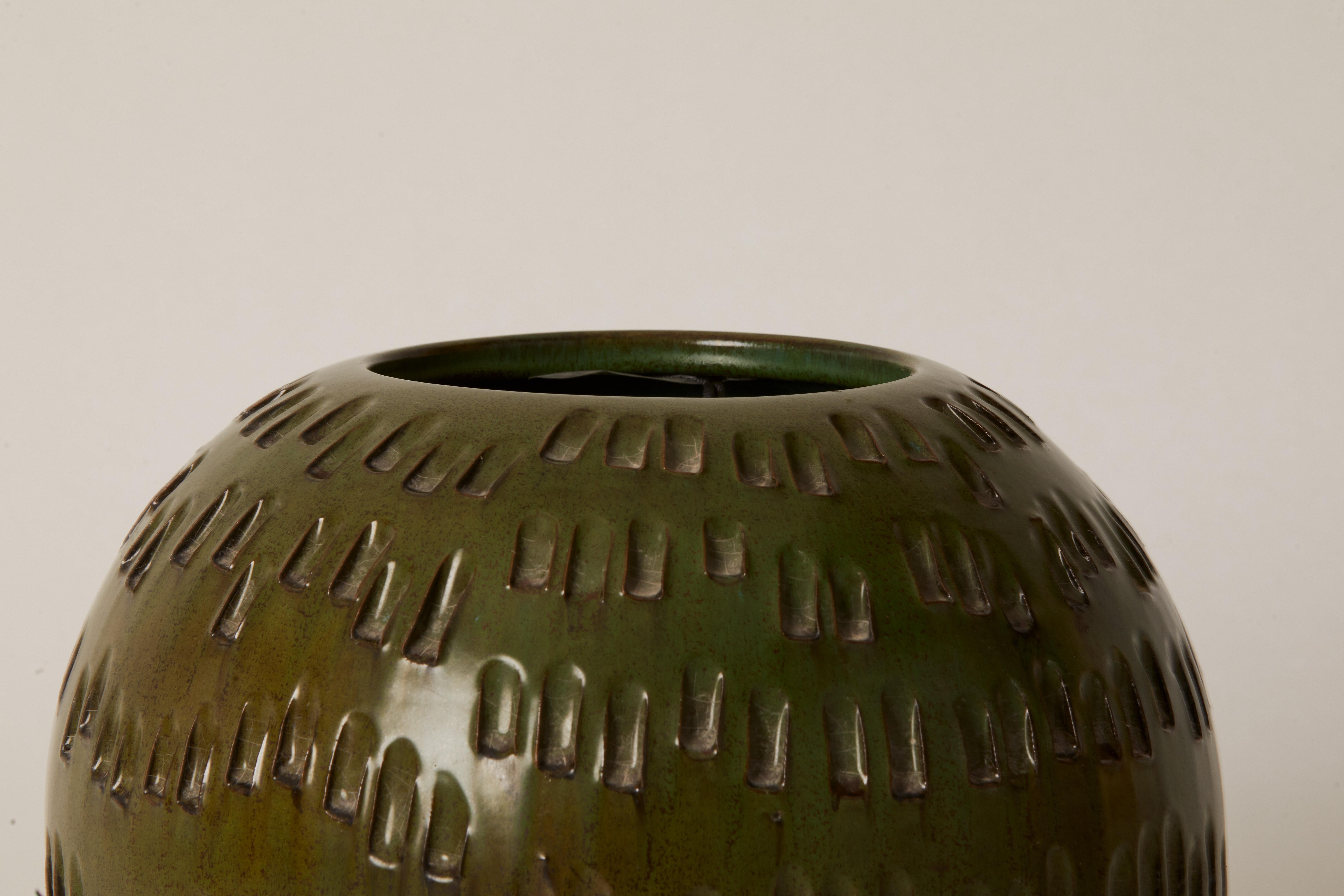 1960s Italian large-scale green circular vase with textured design.