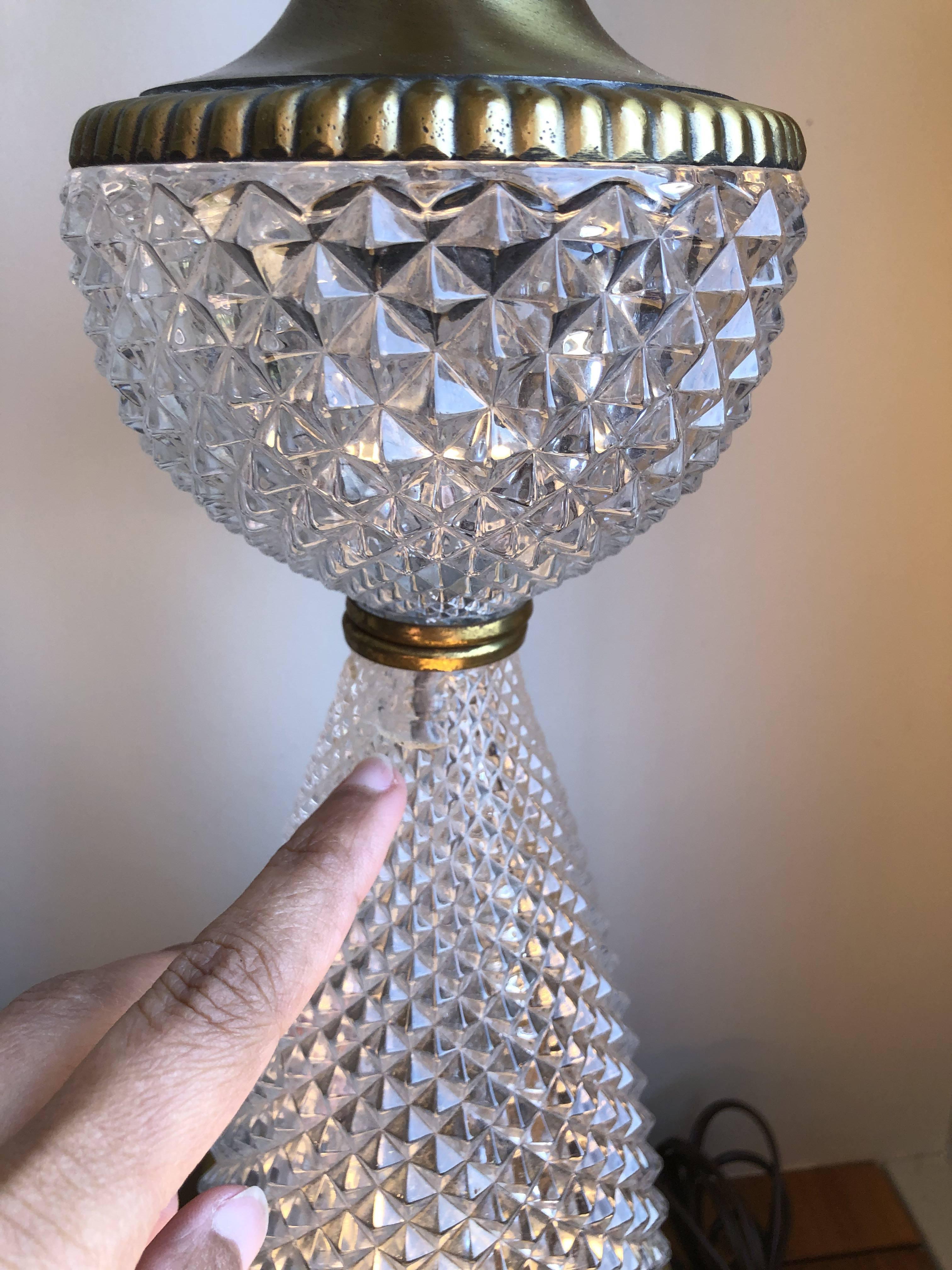 Beautiful pair of Italian crystal lamps. Solid and heavy as the crystal sits on a brass base. Original finials and cords. Excellent working condition. 

Dimensions: 6