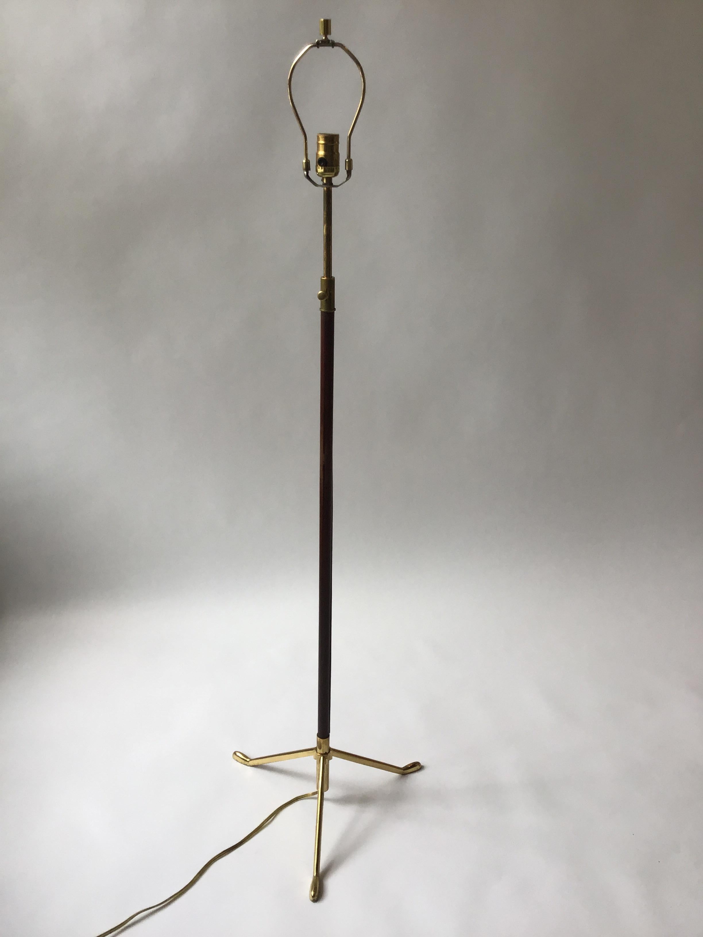 1960s Italian stitched leather floor lamp with brass frame. Adjustable.
Shade not included.