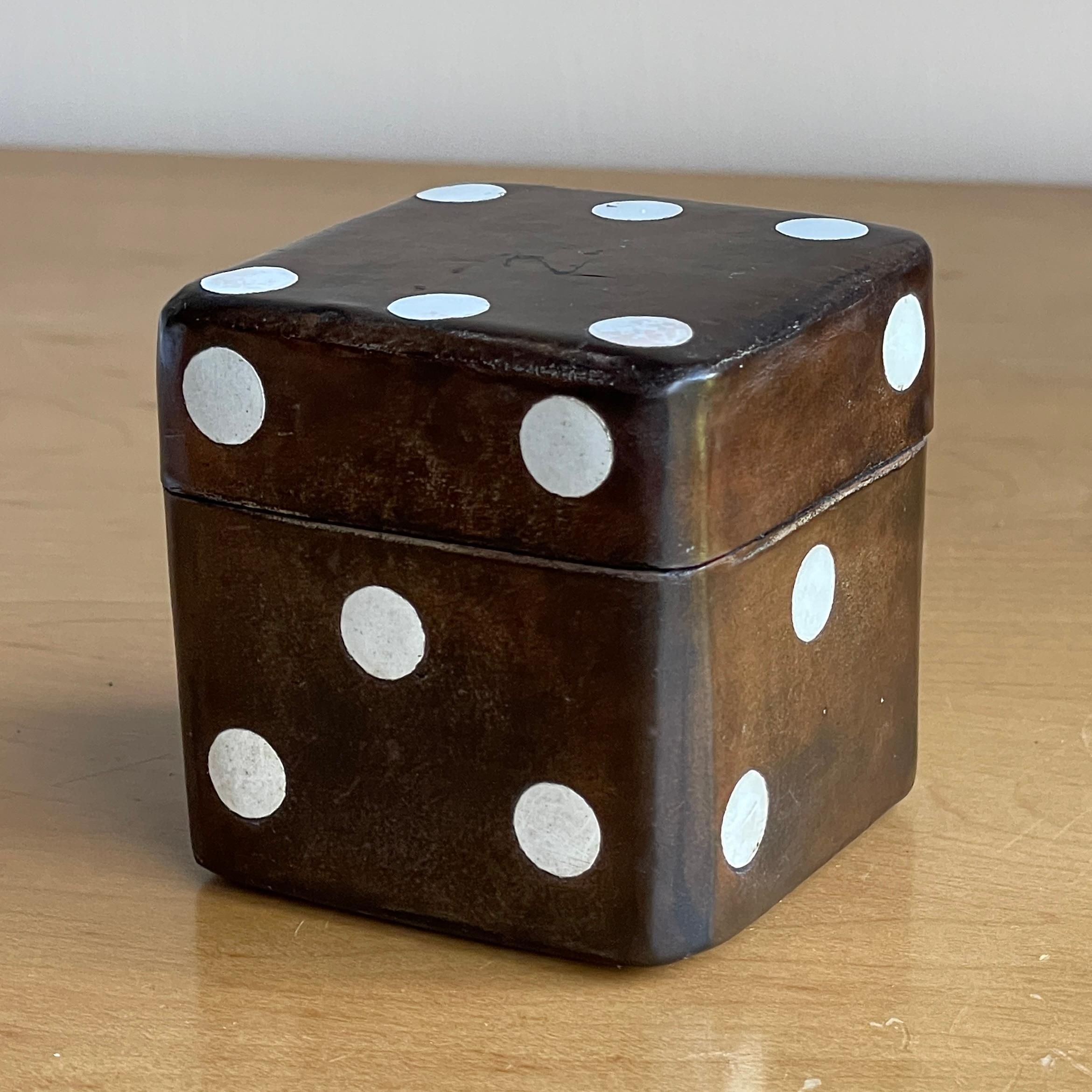 Wonderful petite leather clad lidded box for dominos or backgammon dice. Mid-Century sculptural desktop or shelf relic.  Scratches to top surface finish, pictured
