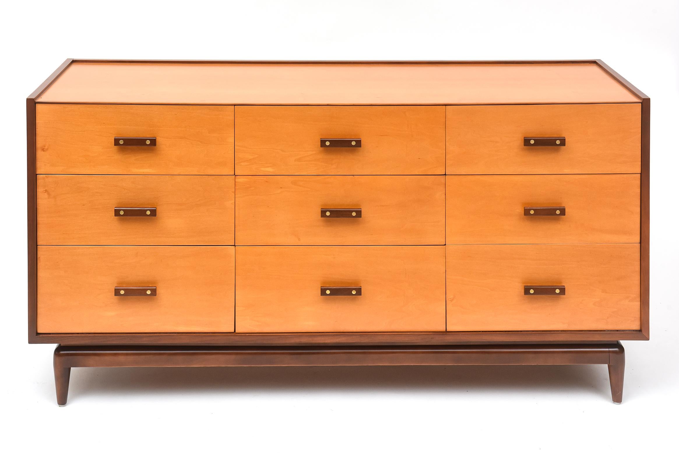 This 1960s Italian dresser charms with its eye-catching combination of light maple, rich walnut trim, and warm polished brass details. Fully restored - inside and out!