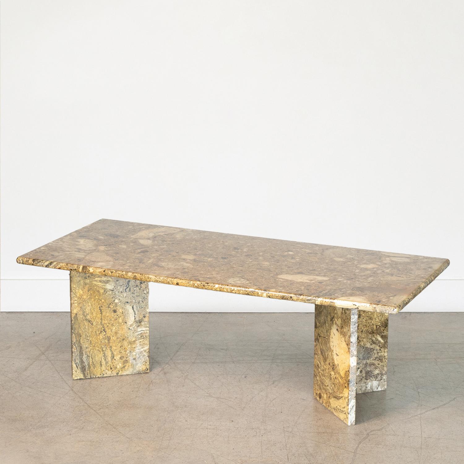 Incredible vintage marble coffee table from Italy, 1960s. Gorgeous marble with deep brown and green coloring. Rectangular top rests on two angular legs. Beautiful and functional statement piece. 

.