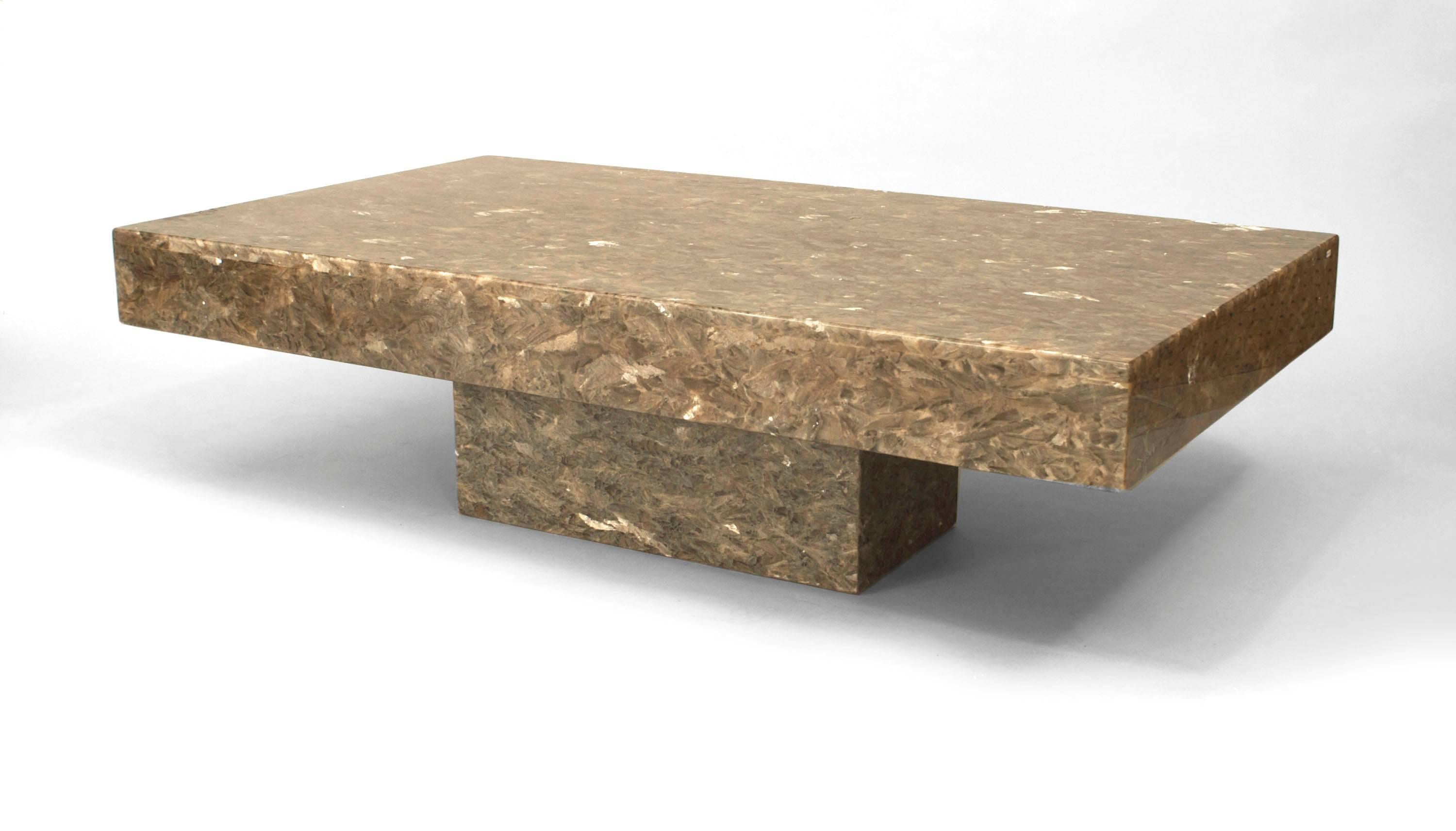 Italian Mid-Century Modern (1960s) rectangular beige mica and resin coffee table resting on a solid base.
