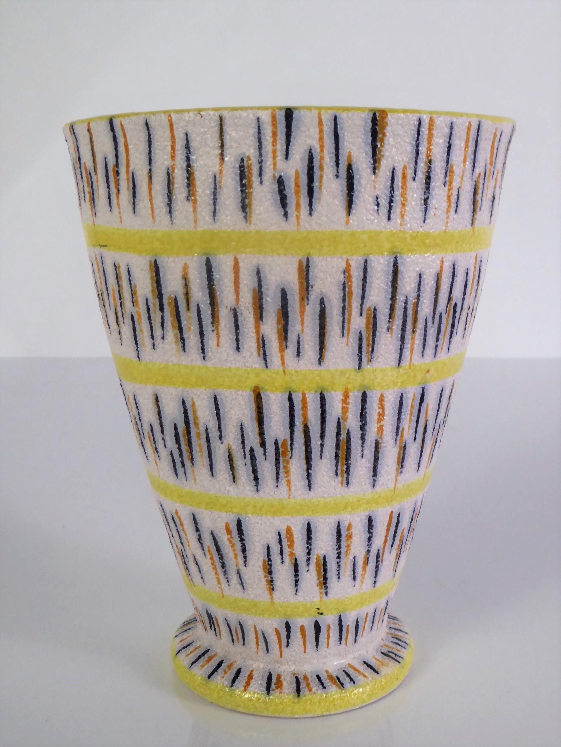 Lovely and cheerful Italian Modern pottery vase from the 1960s attributed to the master ceramicist Aldo Londi for the Bitossi company of Montelupo Italy.
Very Good condition, no issues.
Stamped on bottom 5993 ITALY
Measurements: 4 1/4 deep x 5